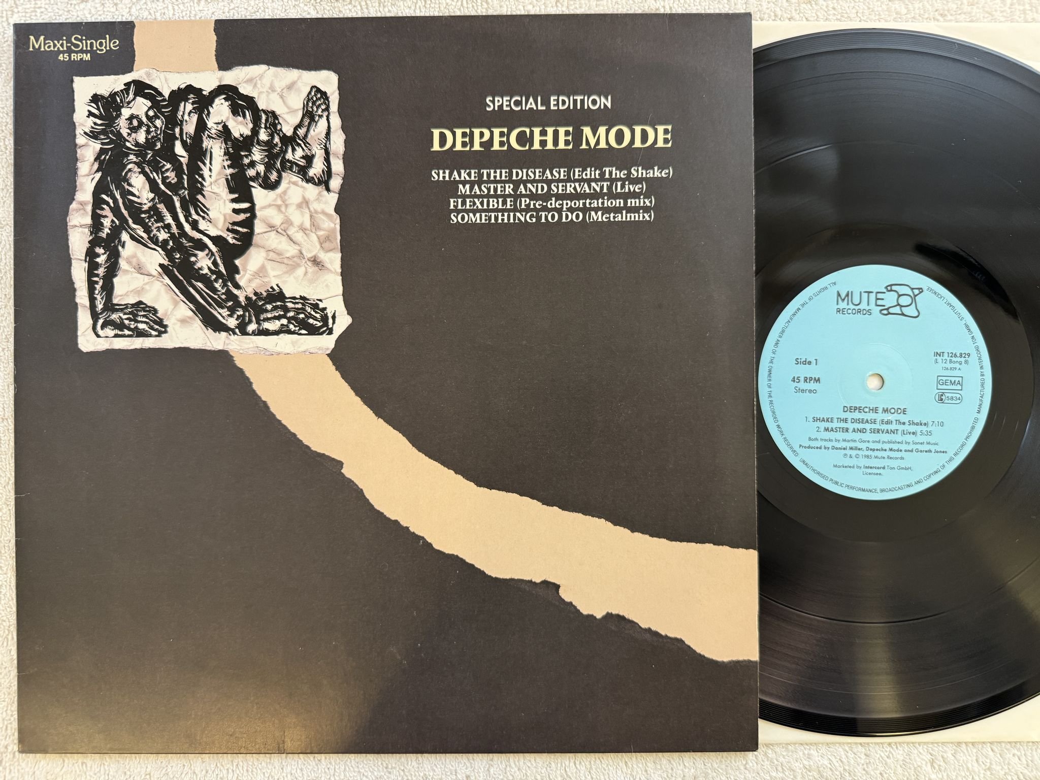 Omslagsbild för skivan DEPECHE MODE shake the disease 12" -85 MUTE INT 126829