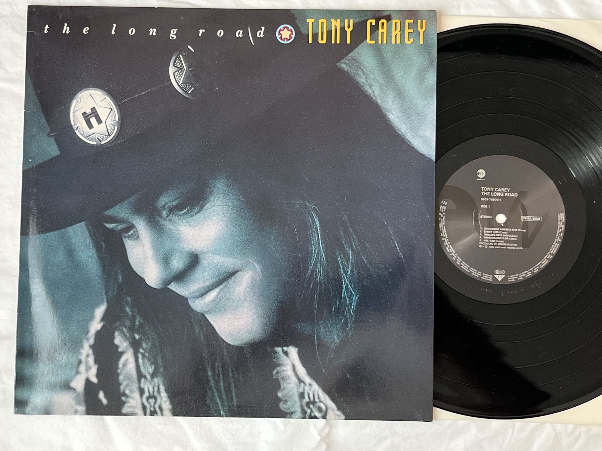 Omslagsbild för skivan TONY CAREY The Long Road LP -92 Ger EASTWEST 9031-76979-1
