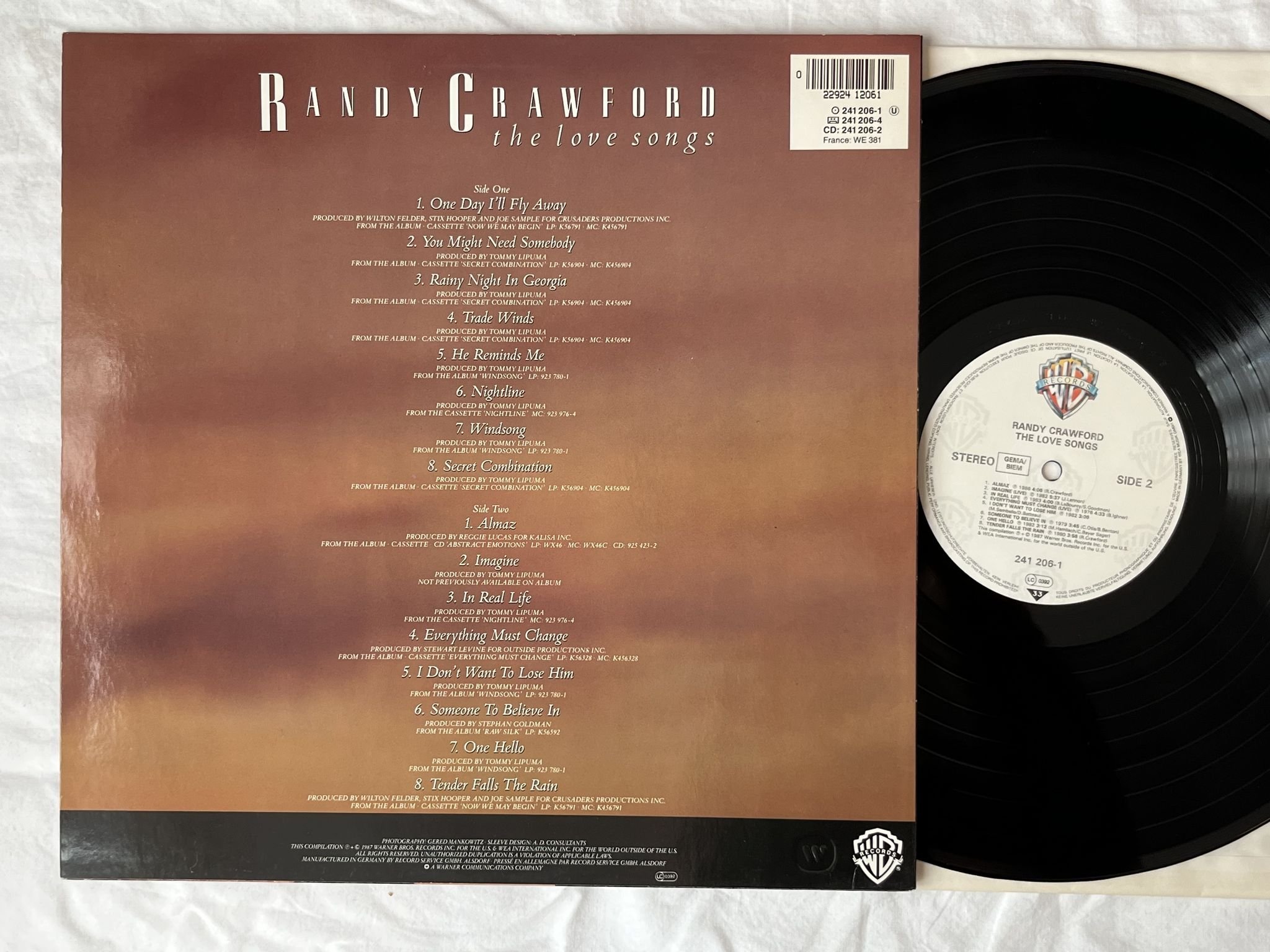 Omslagsbild för skivan RANDY CRAWFORD the love songs LP -87 Ger WARNER BROS 241206-1 ** SIGNED **