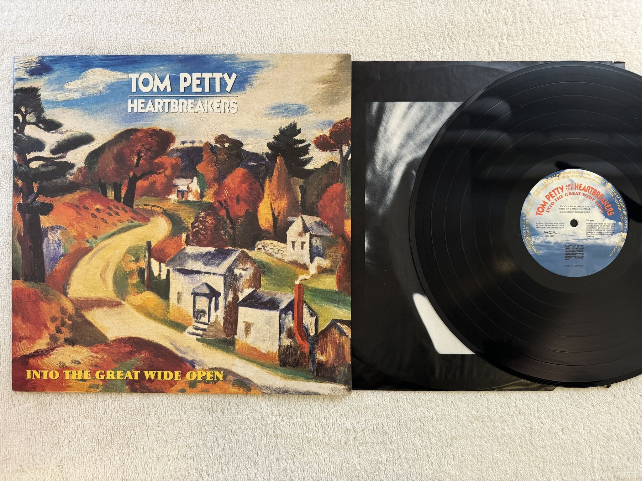 Omslagsbild för skivan TOM PETTY into the great wide open LP -89 Ger MCA 10317