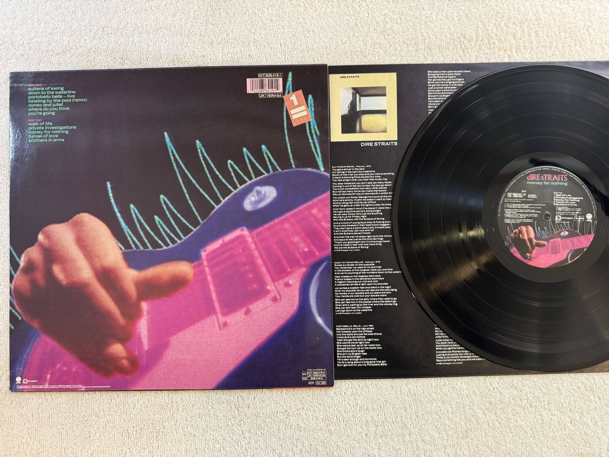 Omslagsbild för skivan DIRE STRAITS money for nothing LP -88 Hol VERTIGO 836419-1