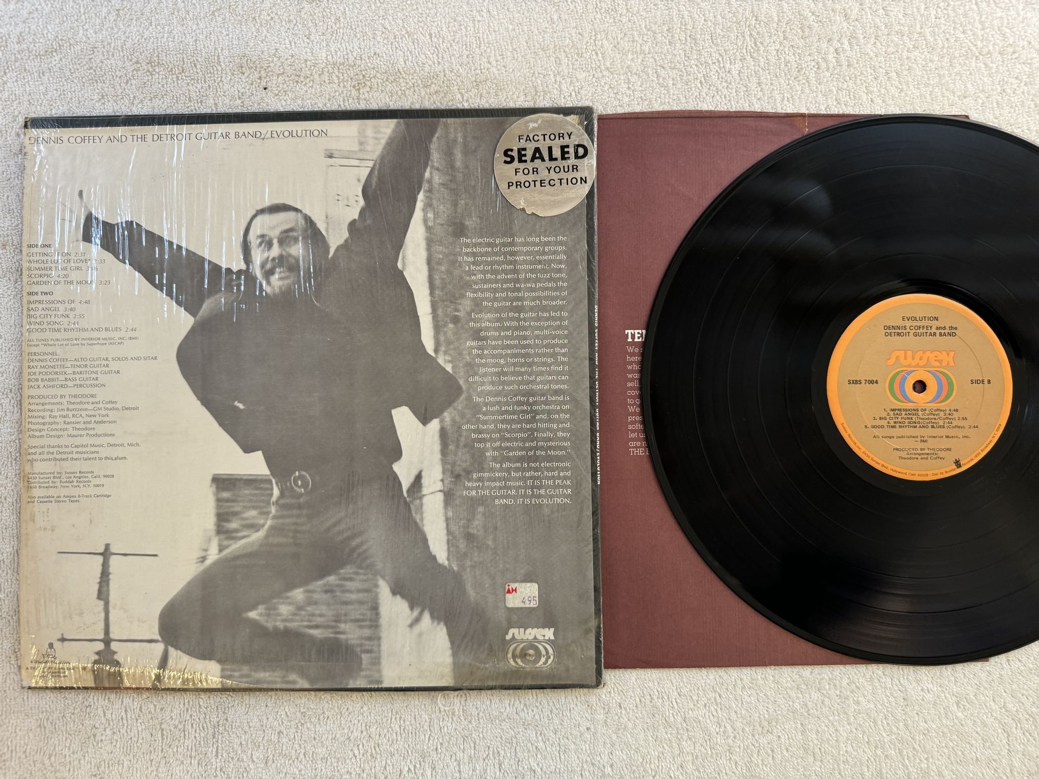 Omslagsbild för skivan DENNIS COFFEY evolution LP -71 US SUSSEX SXBS 7004