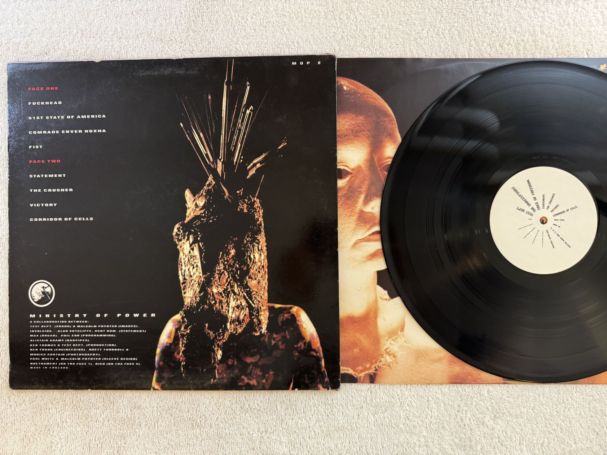 Omslagsbild för skivan TEST DEPT. The Unacceptable Face Of Freedom LP -86 re UK MINISTRY OF POWER MOP 2