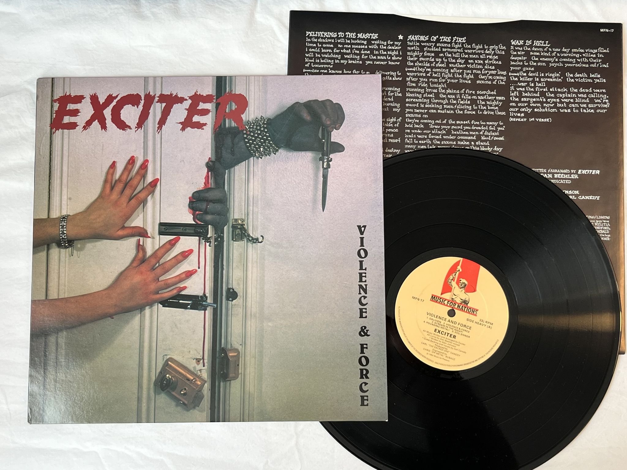 Omslagsbild för skivan EXCITER violence and force LP -84 UK MUSIC FOR NATIONS MFN 17