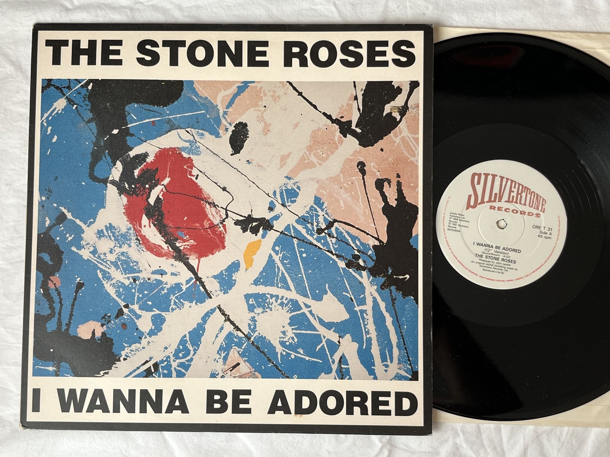 Omslagsbild för skivan THE STONE ROSES I Wanna Be Adored 12" -91 UK SILVERTONE ORE T 31