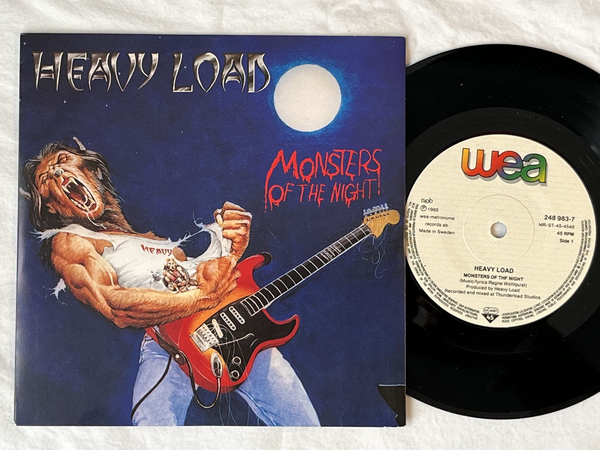 Omslagsbild för skivan HEAVY LOAD monsters of the night 7" -85 Swe WEA 248 983-7
