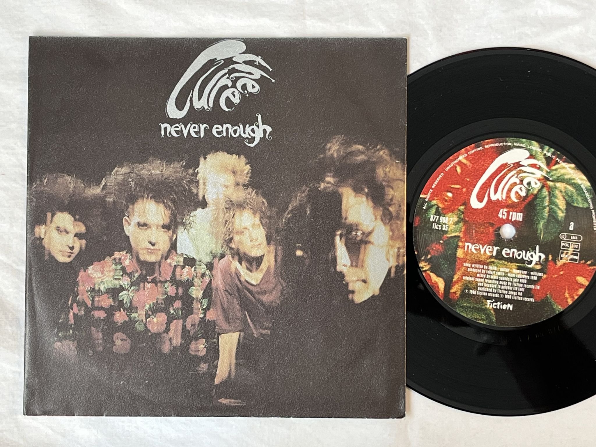 Omslagsbild för skivan THE CURE never enough 7" 90 FICTION FICS 35