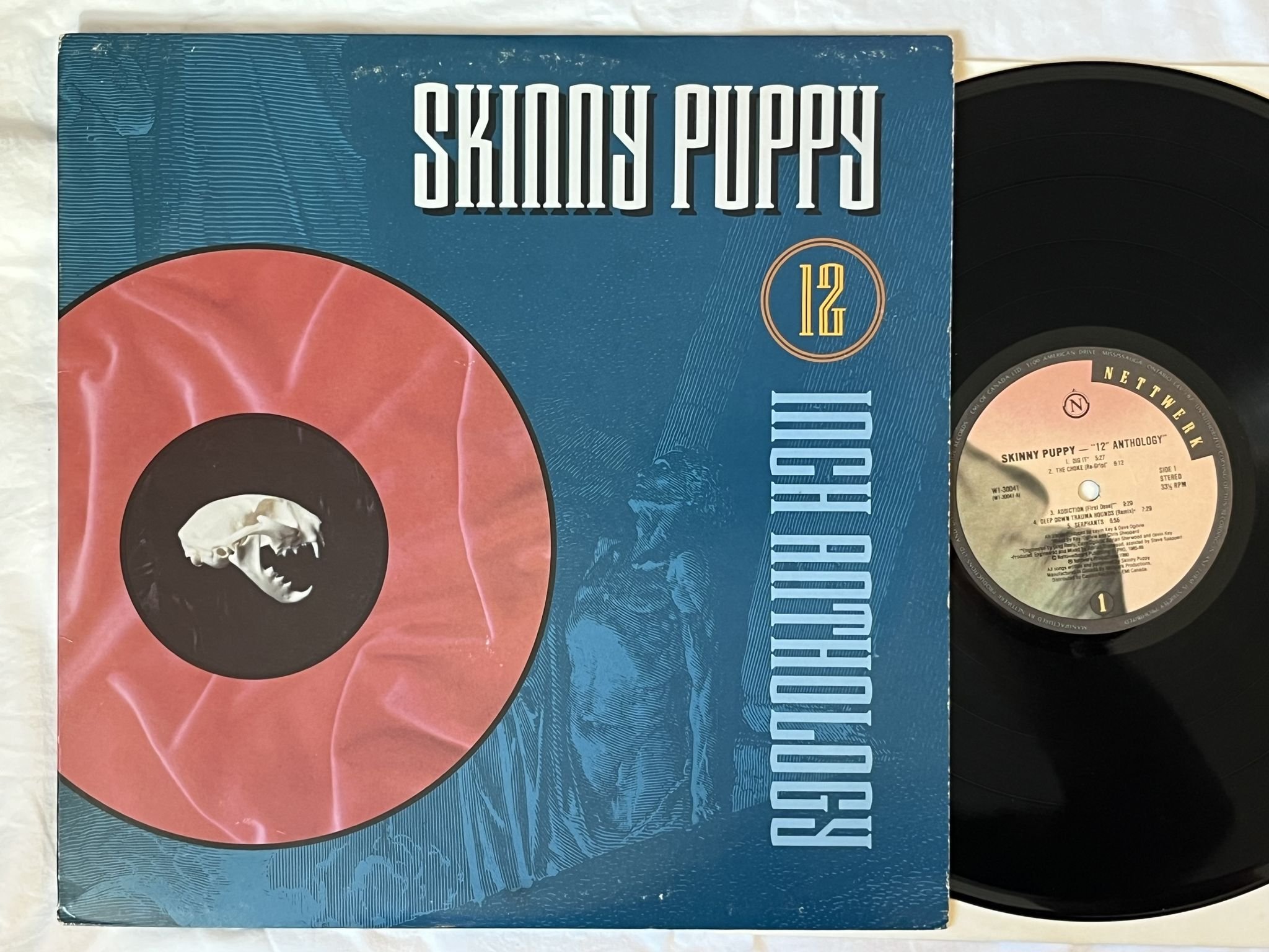 Omslagsbild för skivan SKINNY PUPPY 12 Inch Anthology LP -90 Can NETTWERK W1 30041 ** RARE **