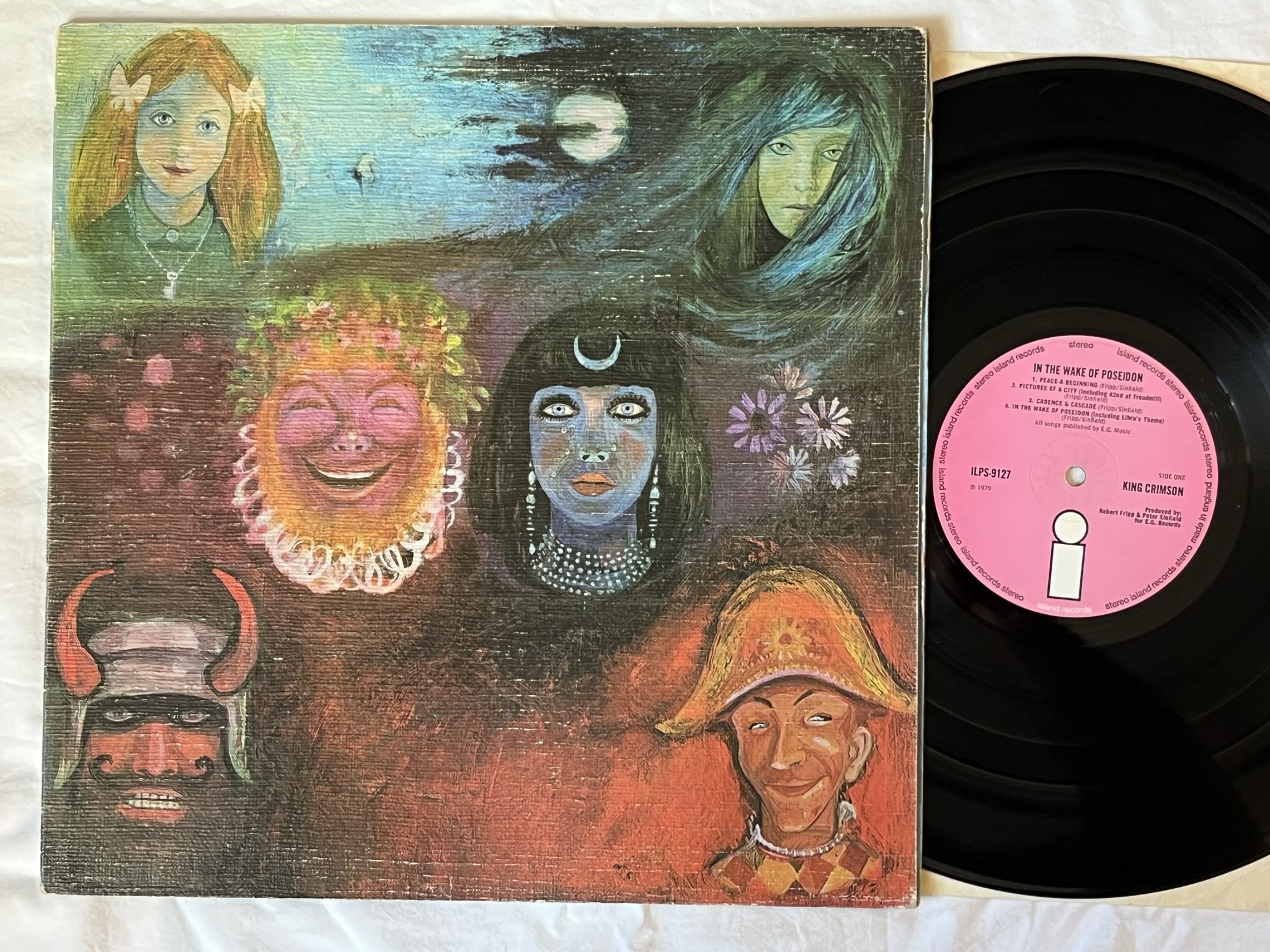 Omslagsbild för skivan KING CRIMSON in the wake of poseidon LP -70 UK pink ISLAND ILPS 9127