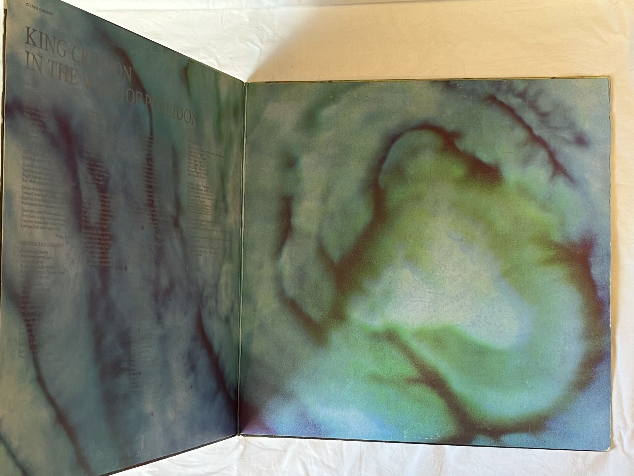 Omslagsbild för skivan KING CRIMSON in the wake of poseidon LP -70 UK pink ISLAND ILPS 9127