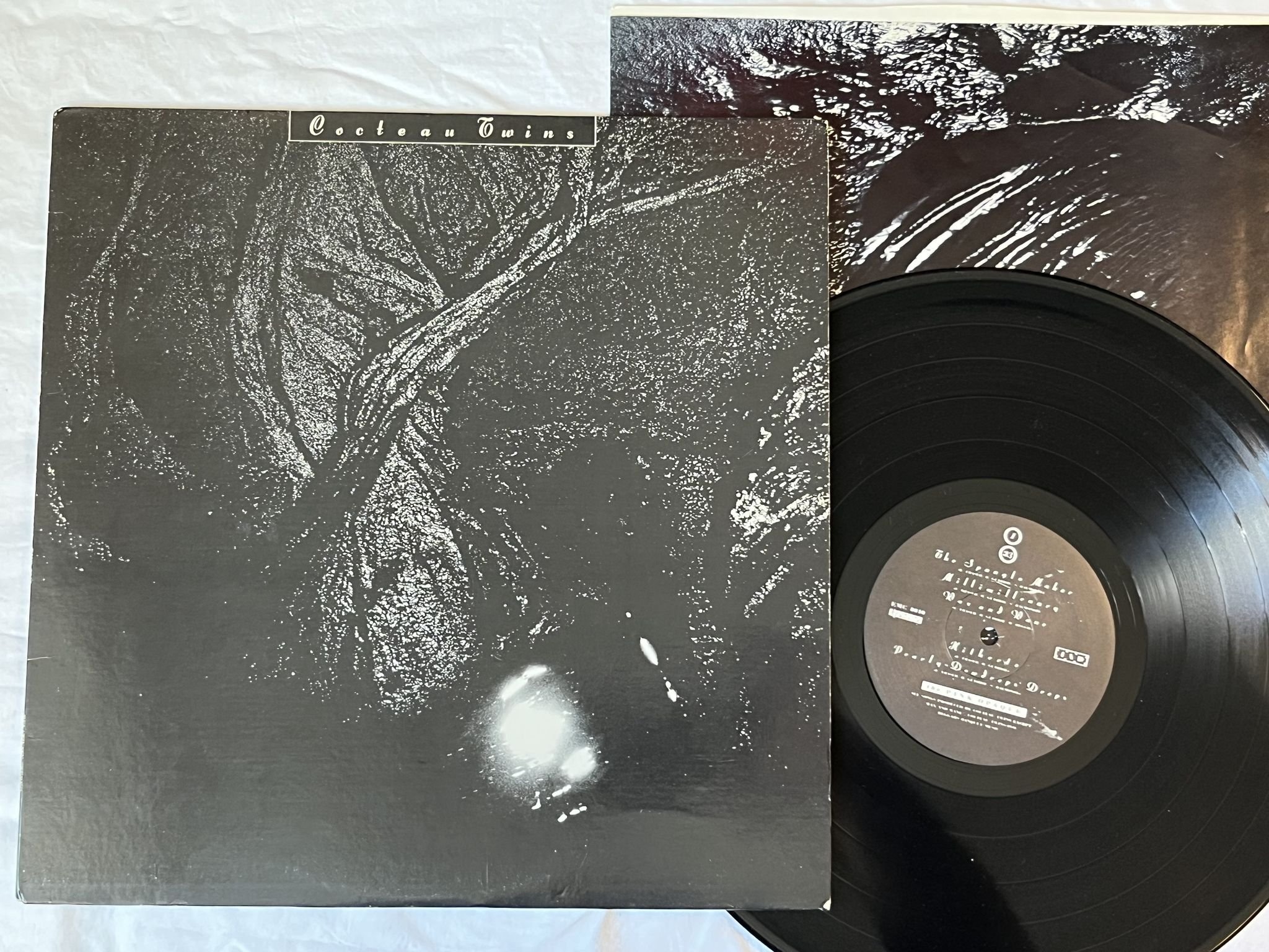 Omslagsbild för skivan COCTEAU TWINS The Pink Opaque LP -86 US 4AD EMC 8040