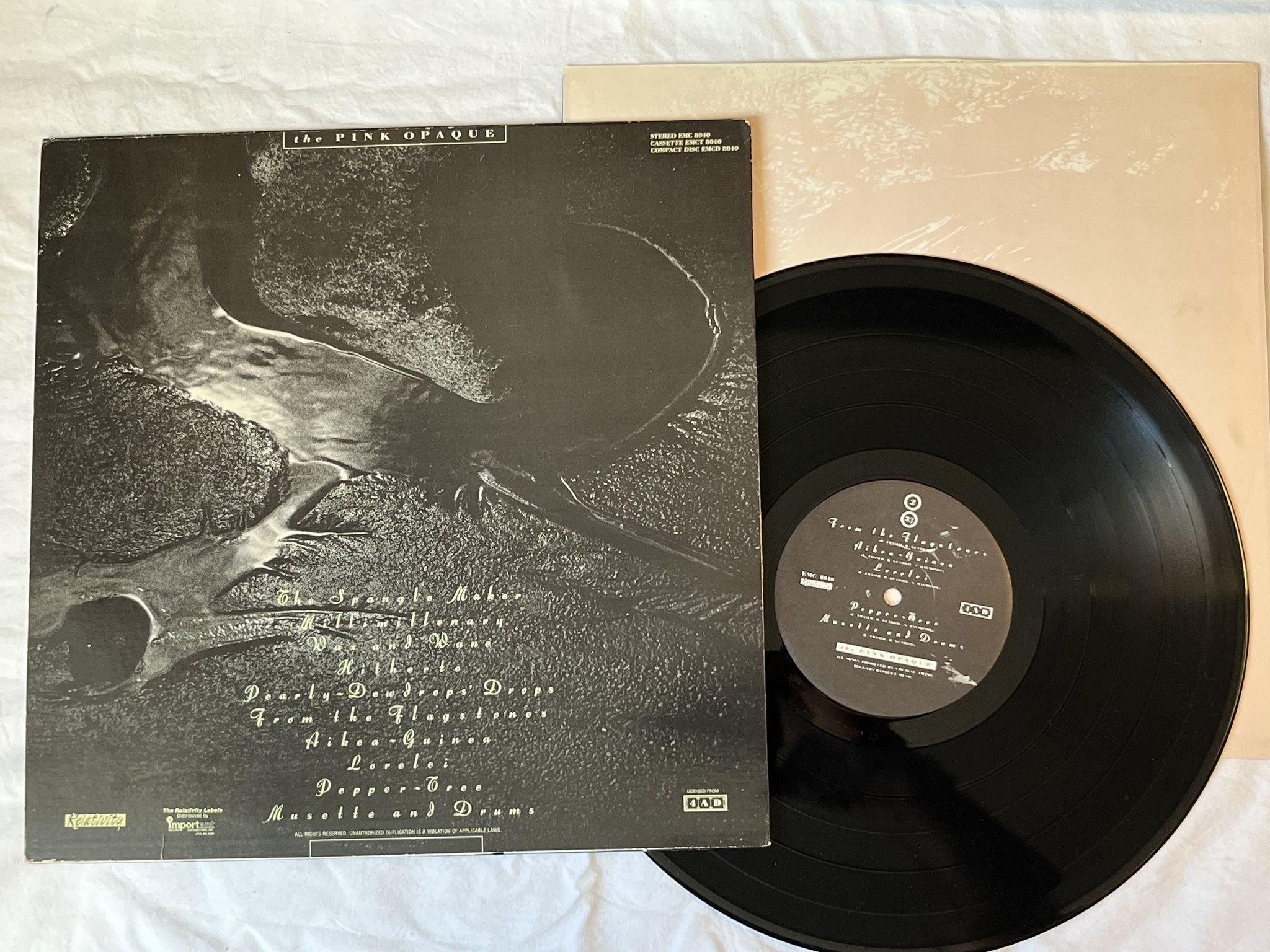 Omslagsbild för skivan COCTEAU TWINS The Pink Opaque LP -86 US 4AD EMC 8040