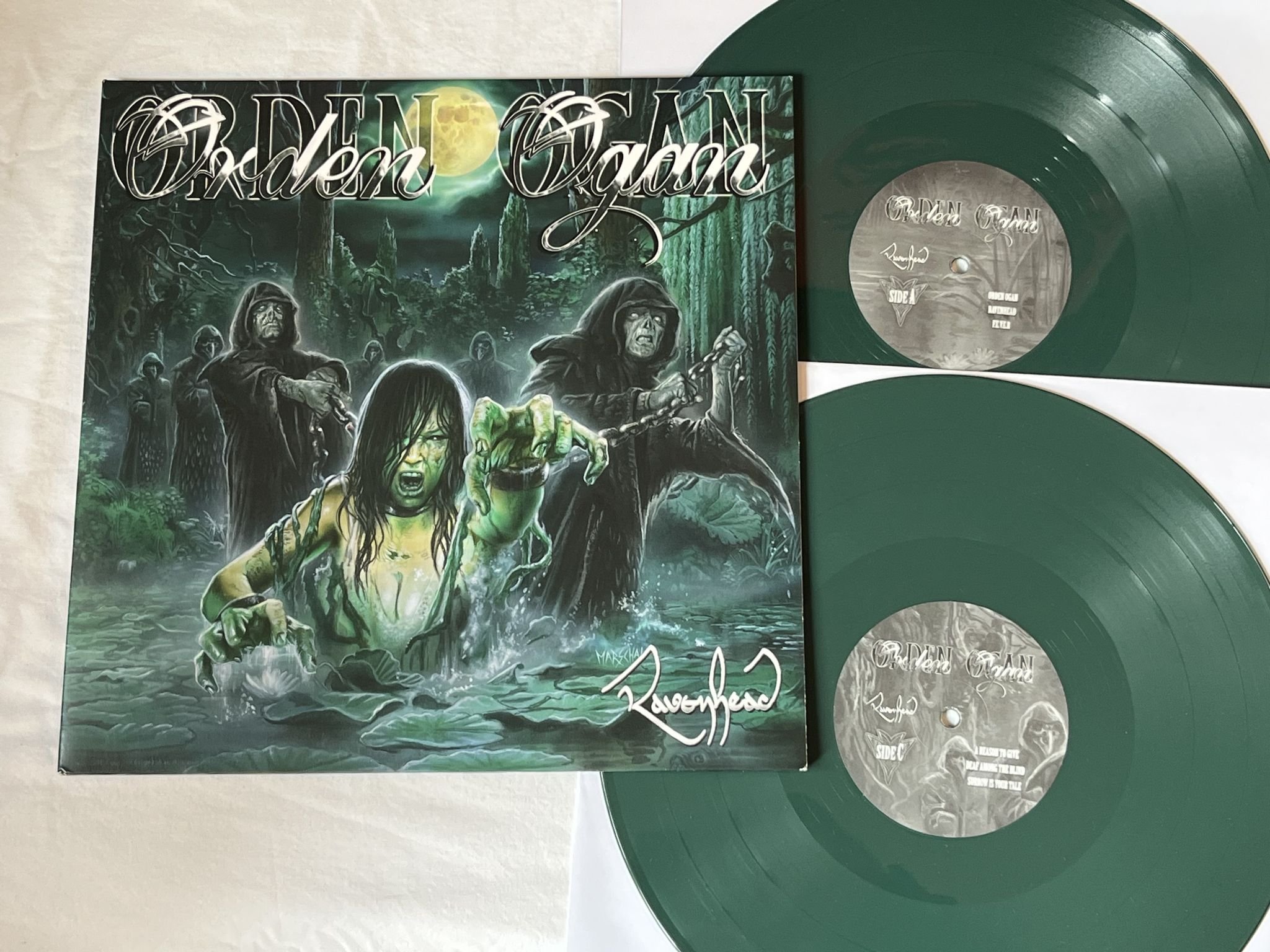 Omslagsbild för skivan ORDEN OGAN Ravenhead 2xLP 2015 AFM RECORDS AFM 499-1 ** GREEN VINYL **