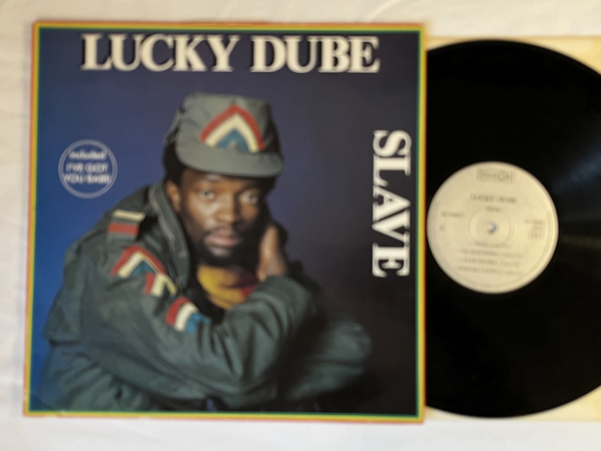 Omslagsbild för skivan LUCKY DUBE slave LP Fra CELLULOID CEL 66834-1
