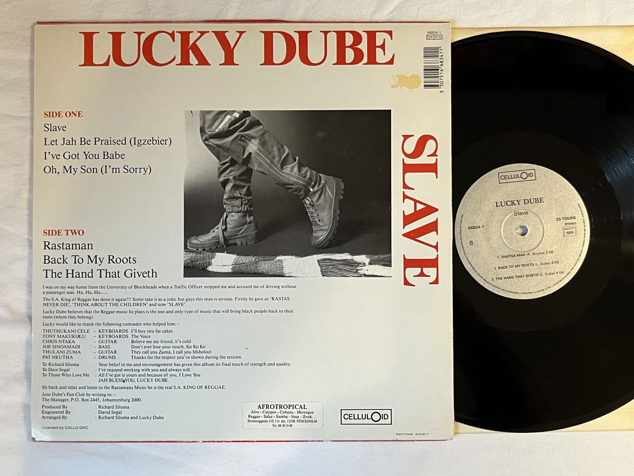 Omslagsbild för skivan LUCKY DUBE slave LP Fra CELLULOID CEL 66834-1