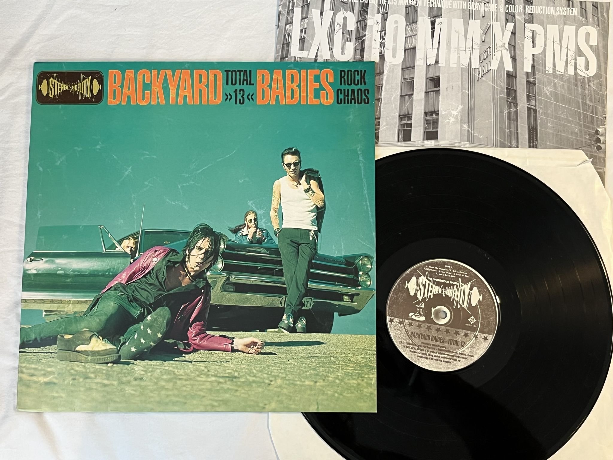 Omslagsbild för skivan BACKYARD BABIES Total 13 LP 1998 Swe MGV RECORDS MVGV 135