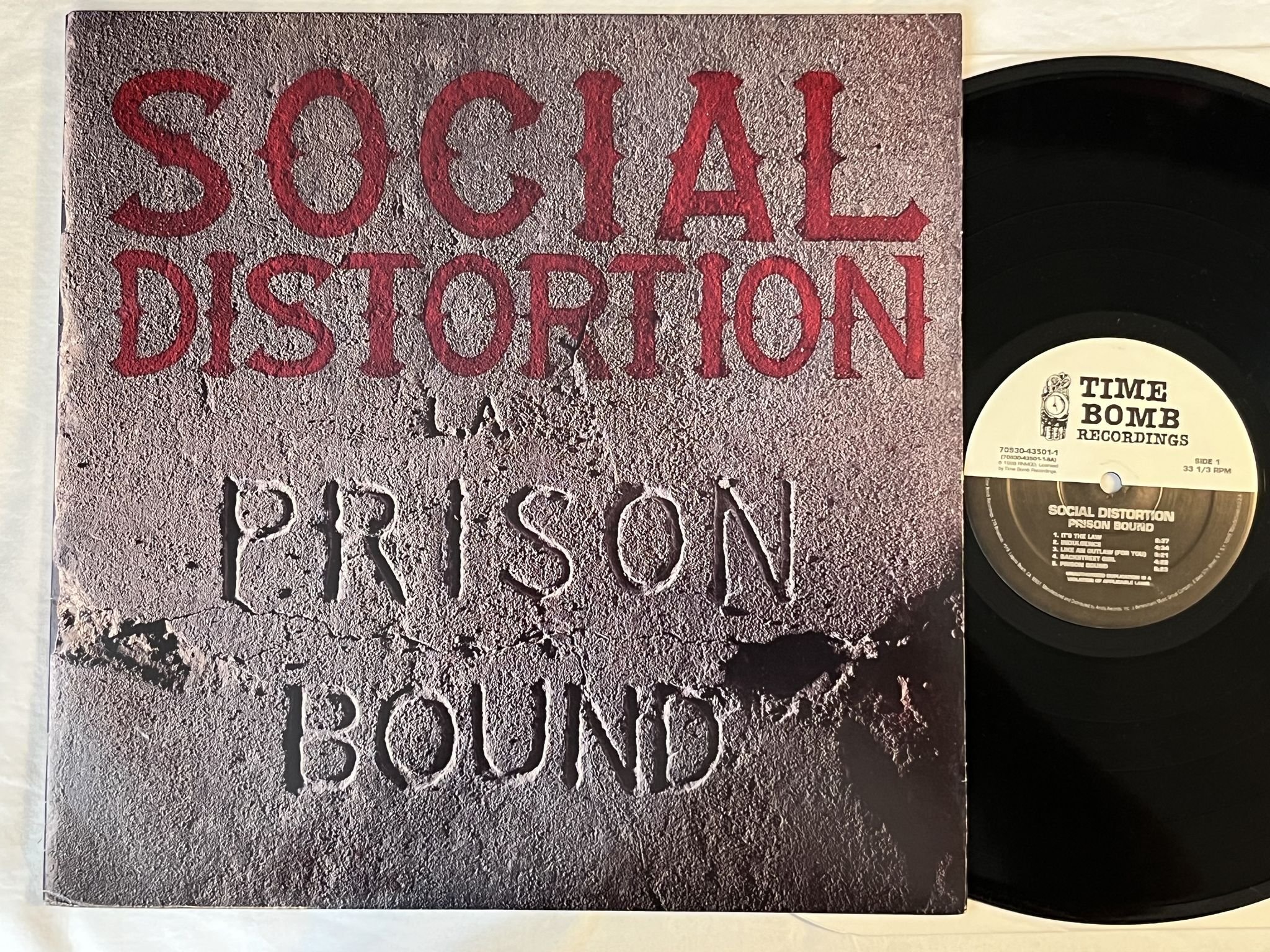 Omslagsbild för skivan SOCIAL DISTORTION Prison Bound LP -95 US TIME BOMB 70930-43501-1