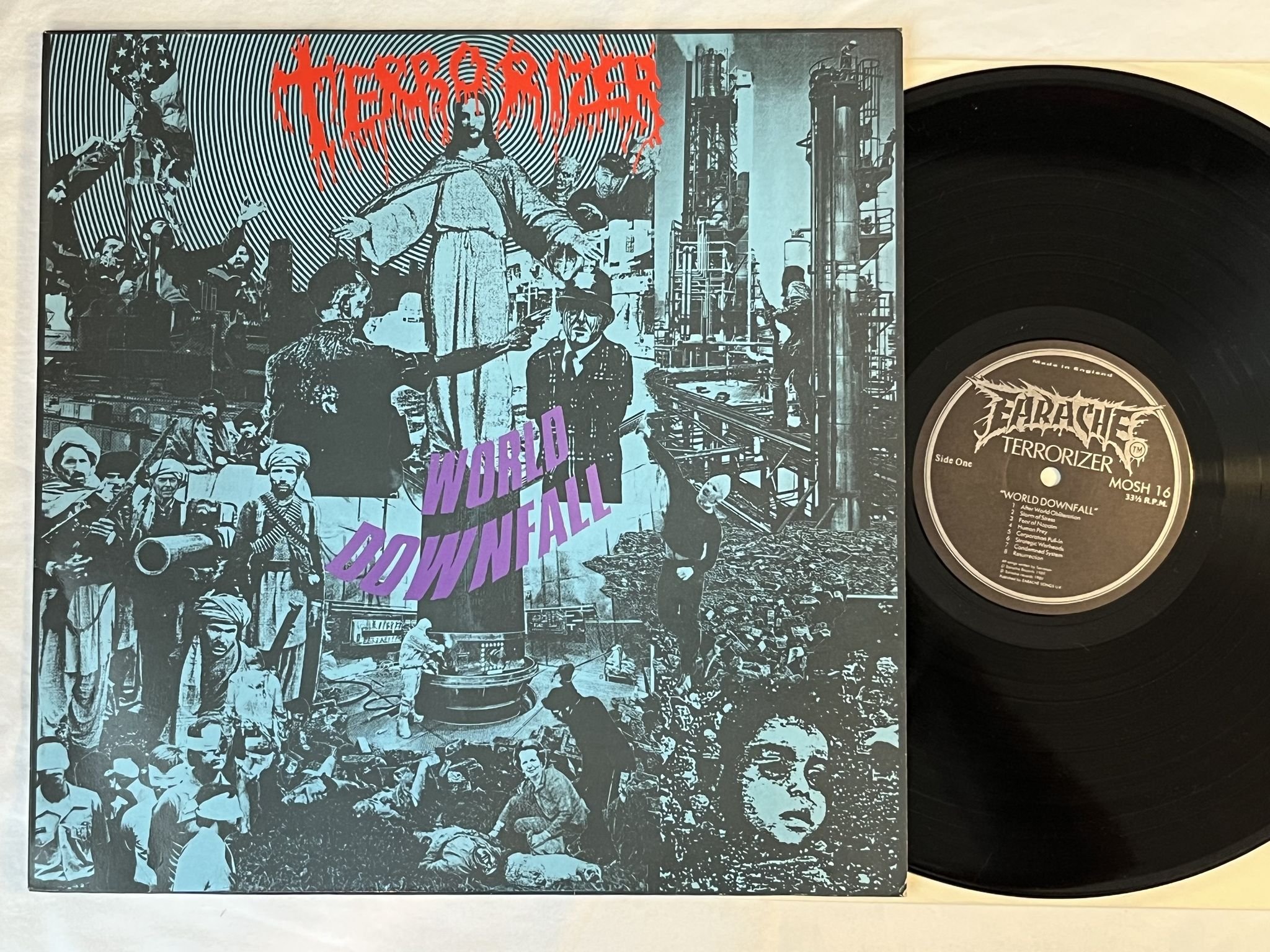Omslagsbild för skivan TERRORIZER world downfall LP -89 UK EARACHE MOSH 16 *** BLUE COVER ***