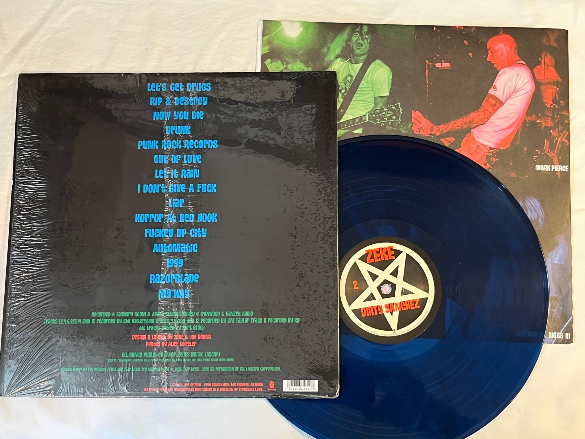 Omslagsbild för skivan ZEKE Dirty Sanchez LP 2000 US EPITAPH 86562-1 ** Blue transparent **