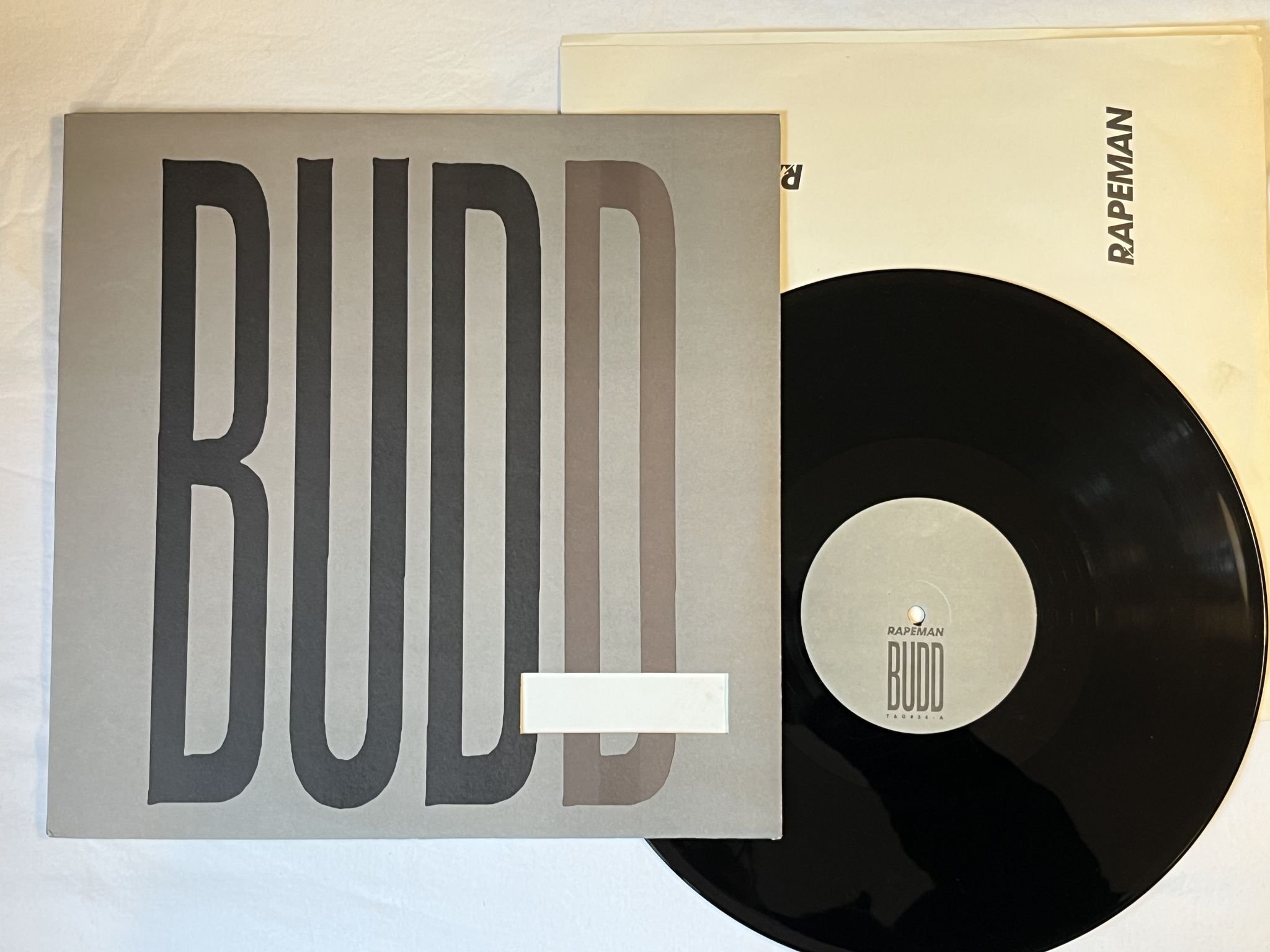 Omslagsbild för skivan RAPEMAN budd 12"ep -88 US TOUCH AND GO T&G#34 *** NOISE ROCK ***