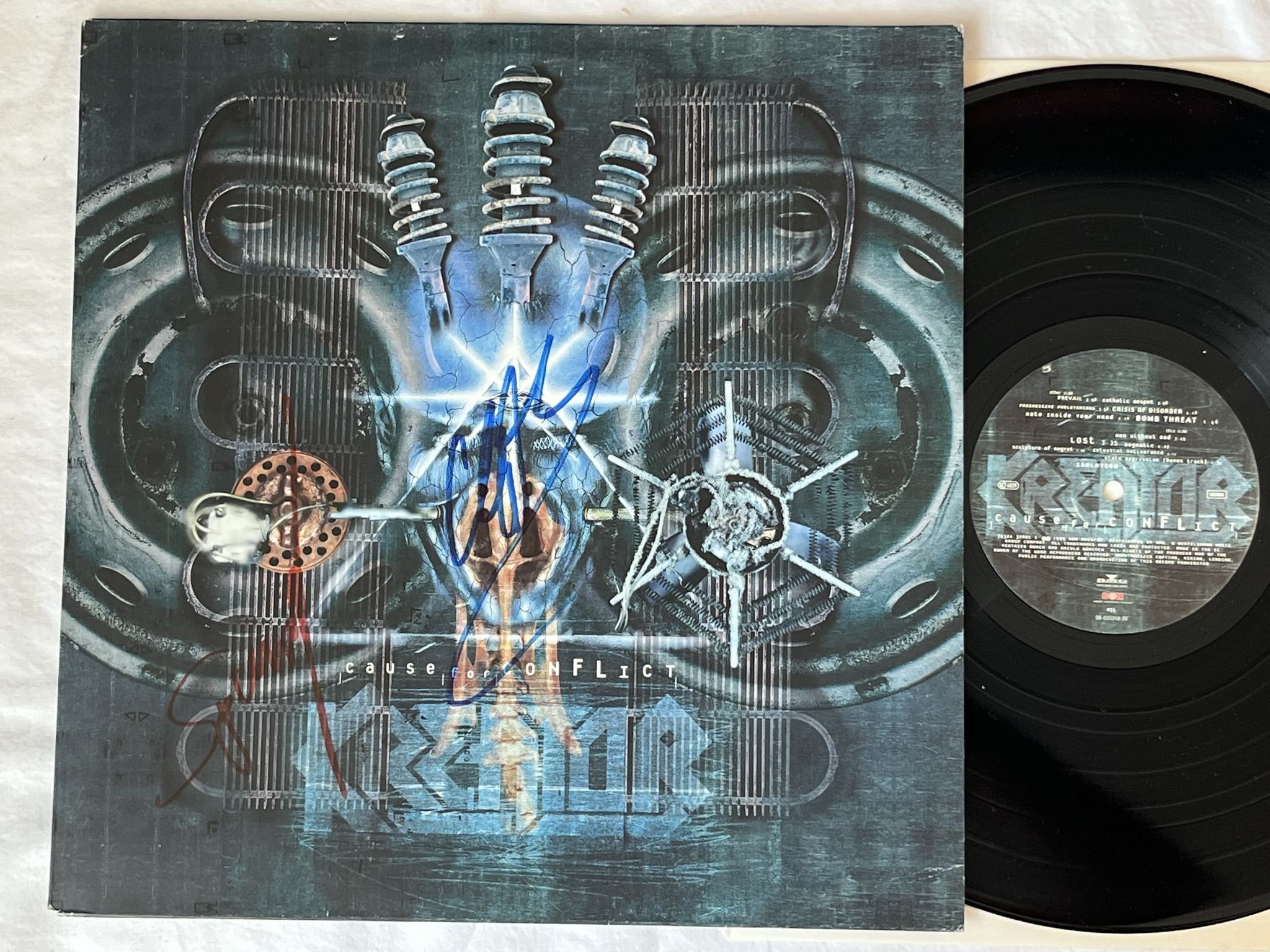 Omslagsbild för skivan KREATOR Cause For Conflict LP -95 GUN 071 *** Signed by two members ***