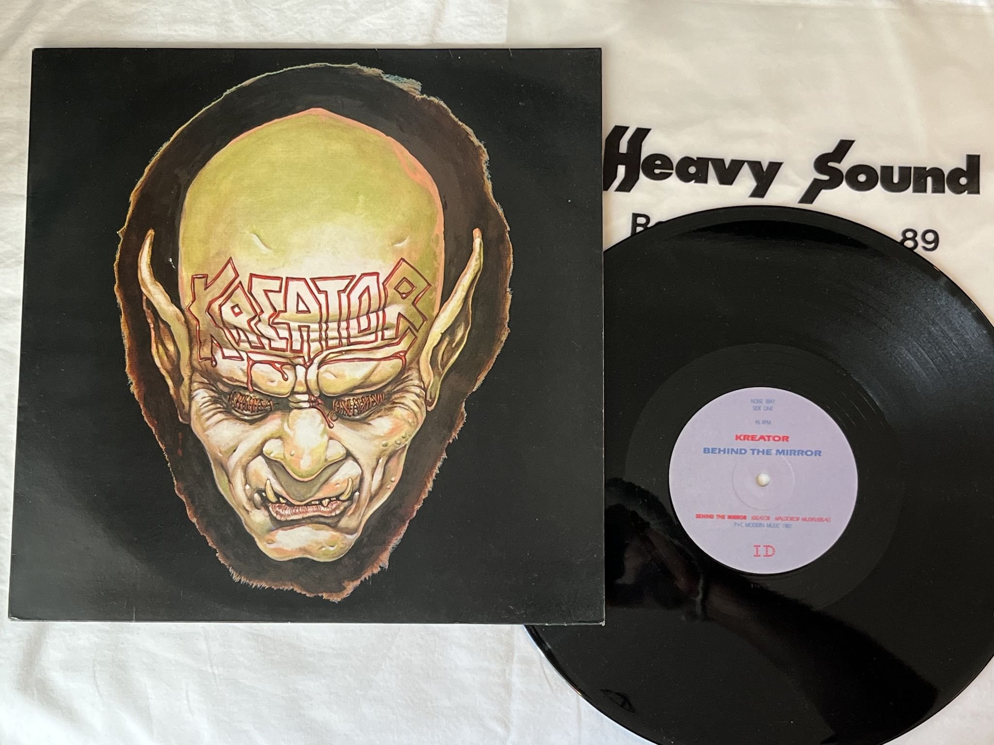 Omslagsbild för skivan KREATOR Behind The Mirror 12" -87 UK noise NOISE084T