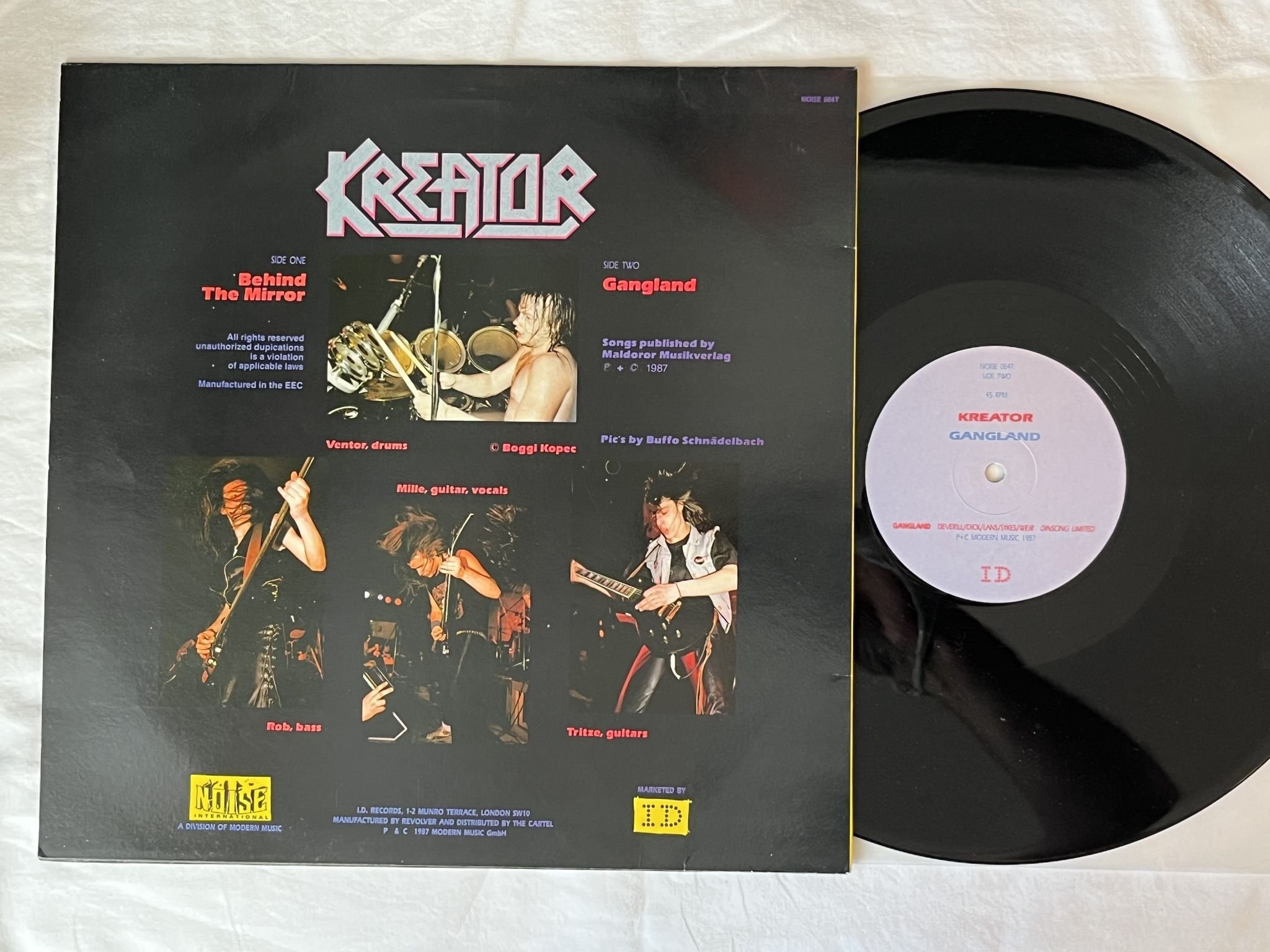 Omslagsbild för skivan KREATOR Behind The Mirror 12" -87 UK noise NOISE084T
