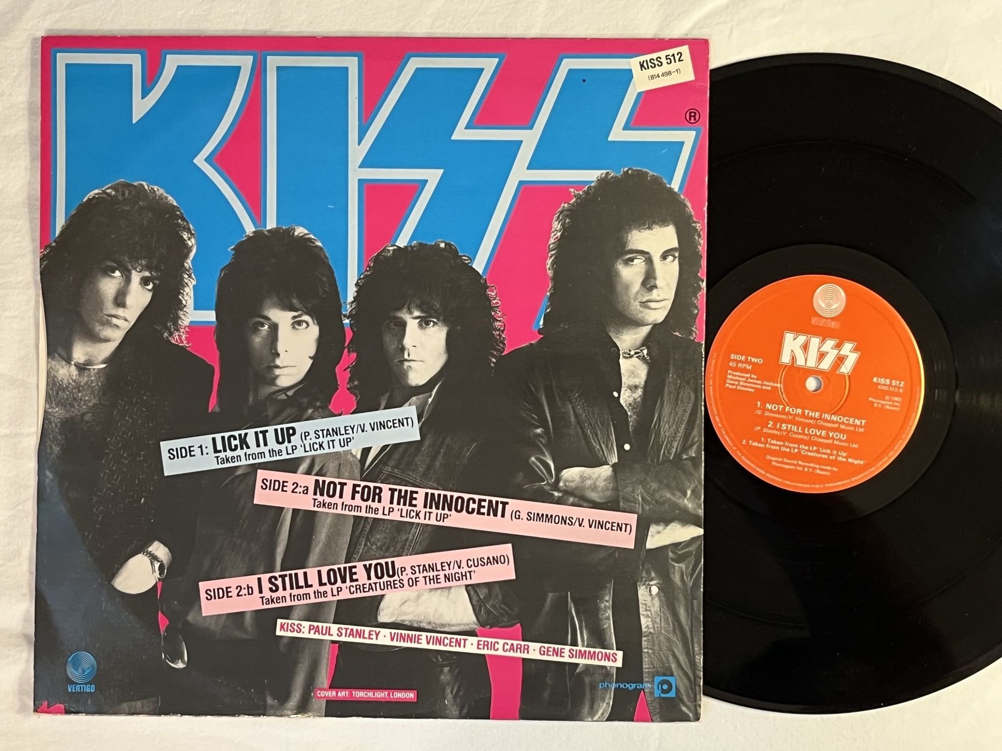 Omslagsbild för skivan KISS lick it up 12"Single -83 UK VERTIGO KISS 512