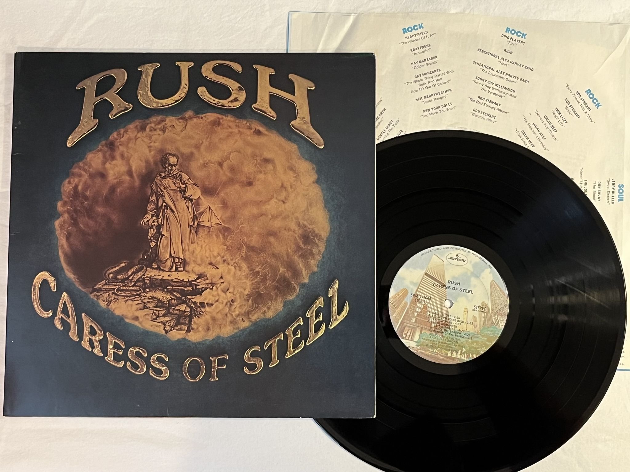 Omslagsbild för skivan RUSH caress of steel LP -75 US MERCURY SRM-1-1046