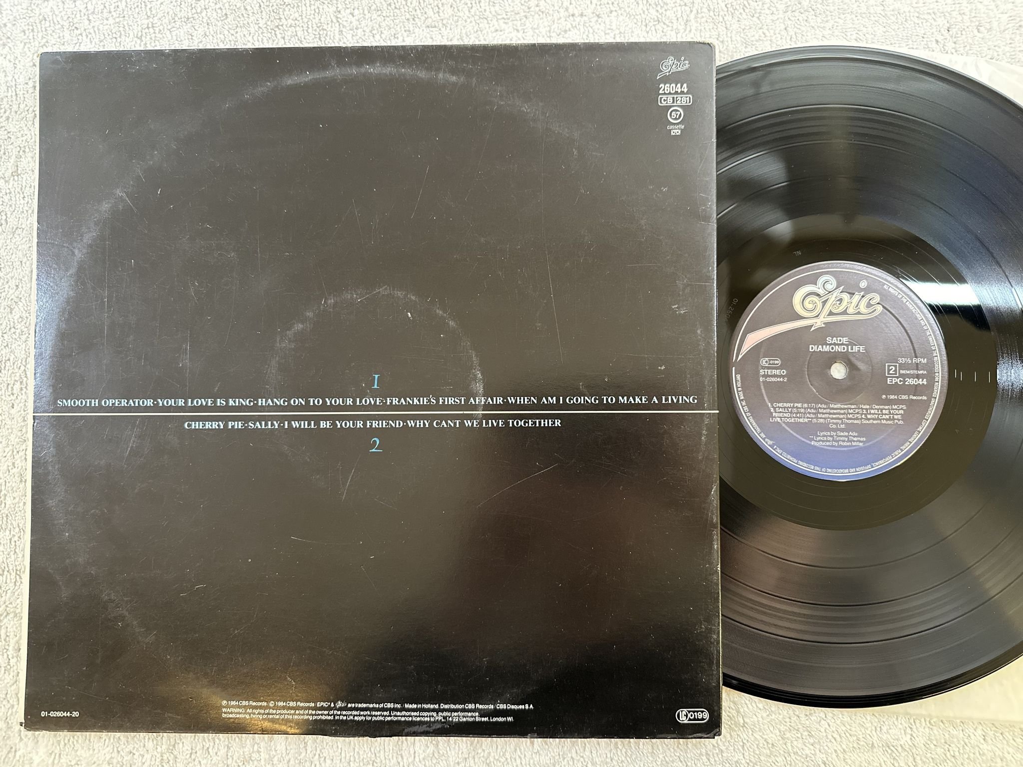 Omslagsbild för skivan SADE promise LP -85 EPIC EPC 26044