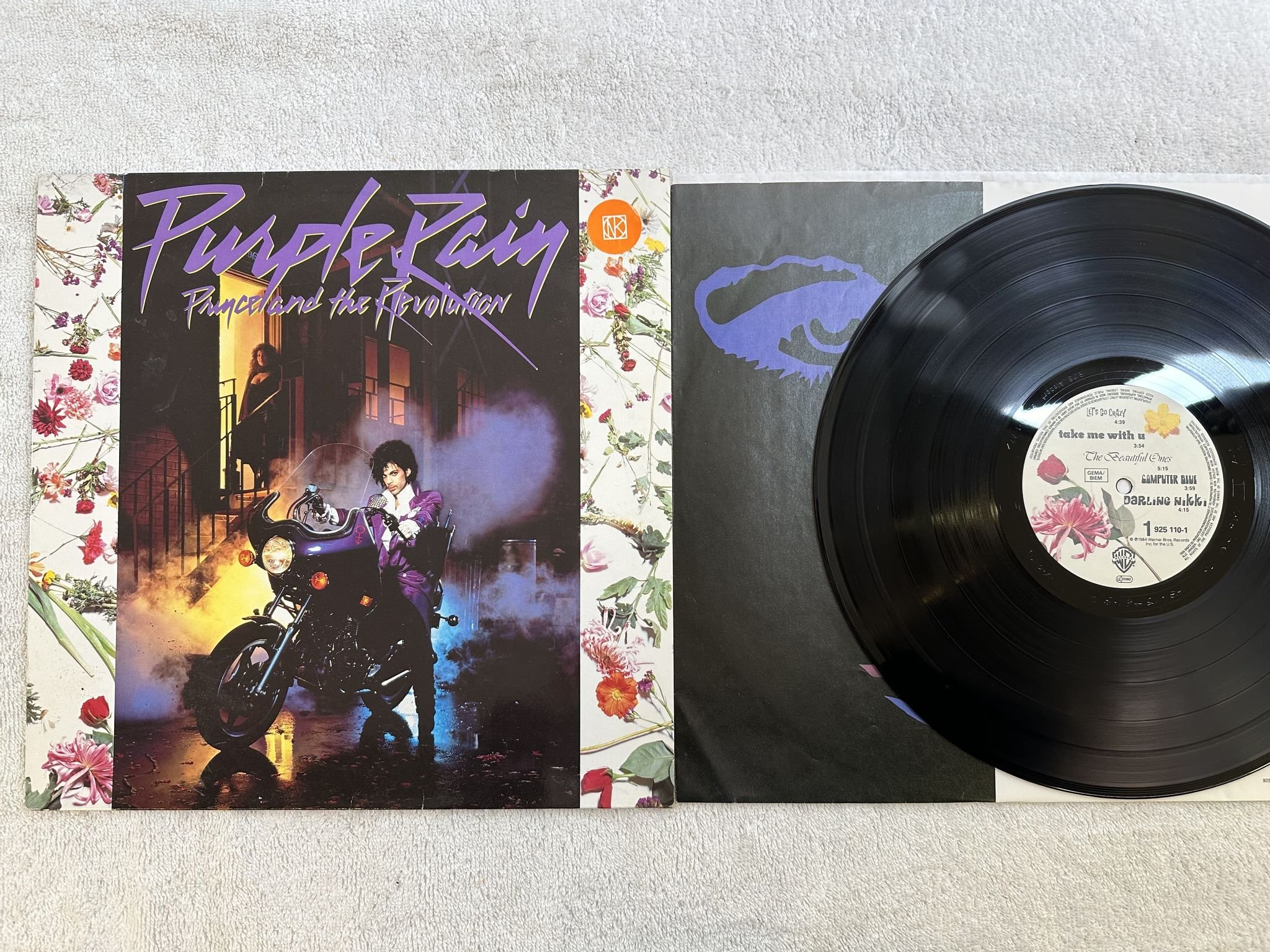Omslagsbild för skivan PRINCE purple rain LP -84 Ger WARNER BROS 925110-1 ** CLASSIC **