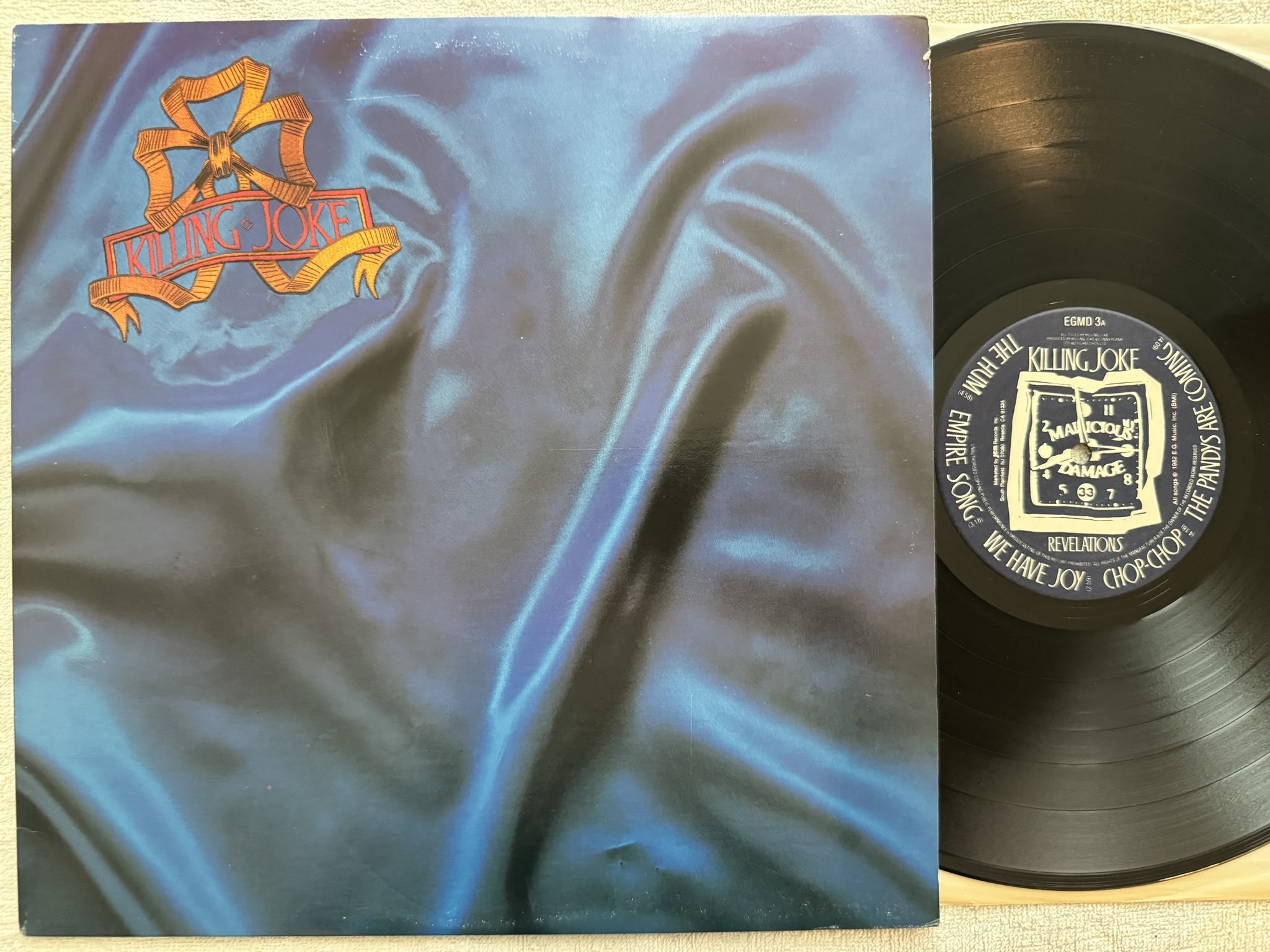 Omslagsbild för skivan KILLING JOKE Revelations LP -82 US Editions EG – EGMD 3