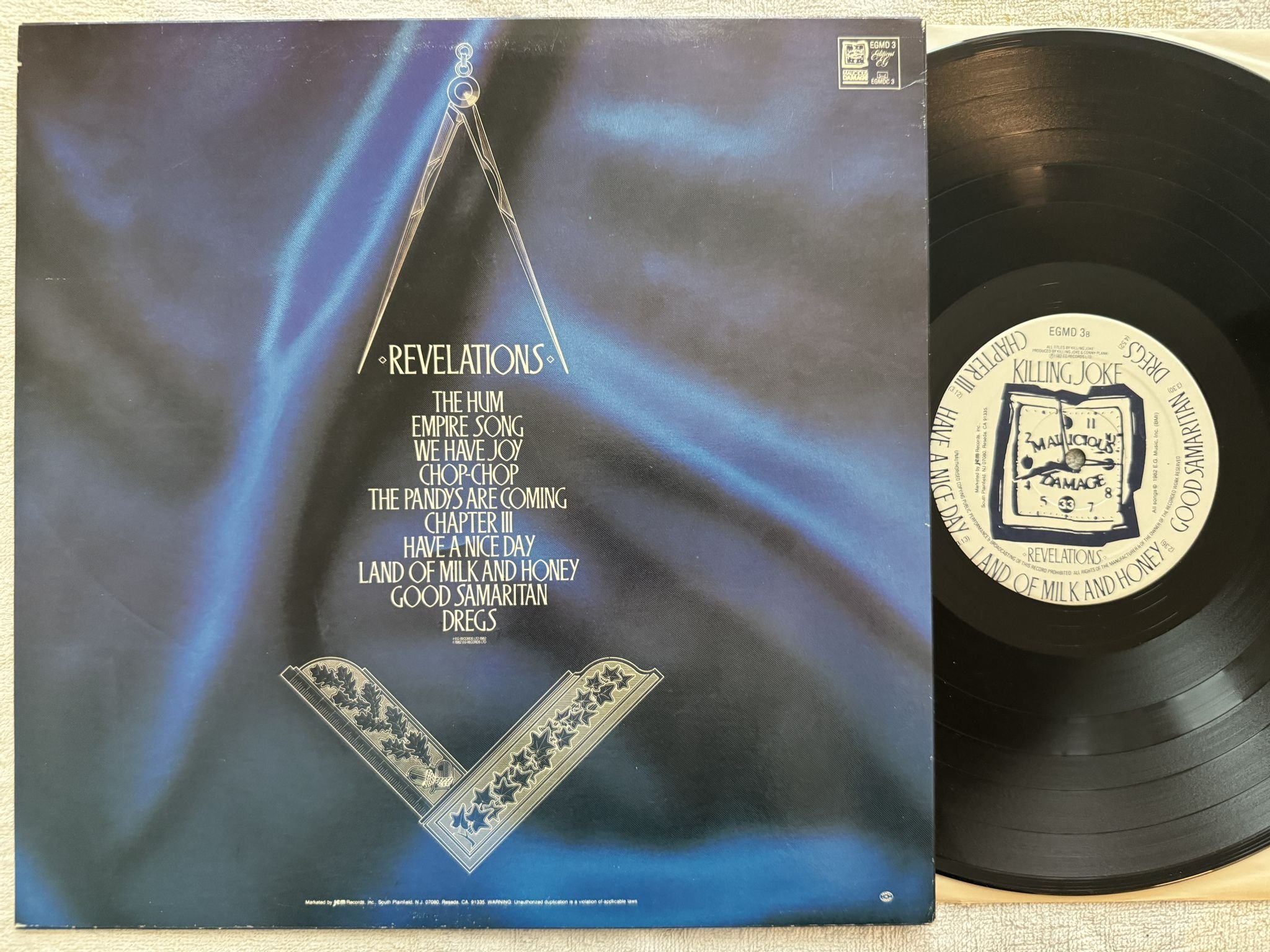 Omslagsbild för skivan KILLING JOKE Revelations LP -82 US Editions EG – EGMD 3