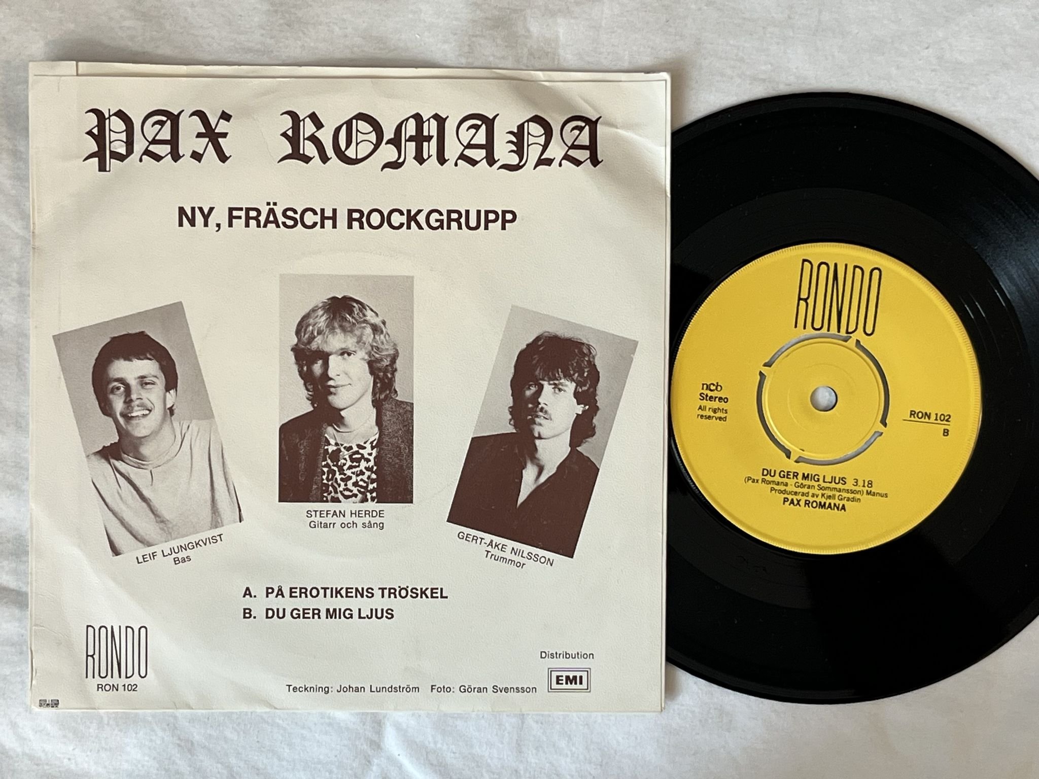 Omslagsbild för skivan PAX ROMANA ny, fräsch rockgrupp "7"Singel- 82 SWE RON 102 RONDO