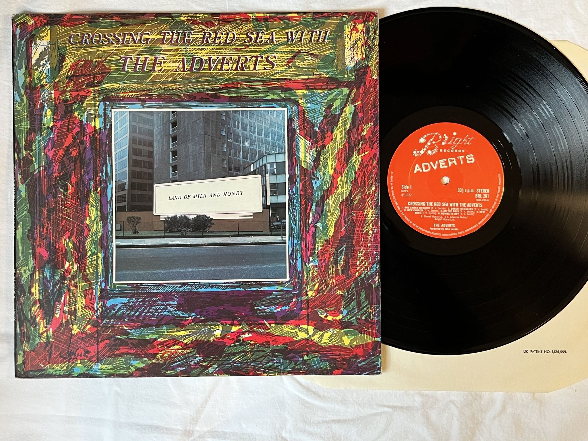 Omslagsbild för skivan THE ADVERTS crossing the red sea with the adverts LP-78 BRL 201 BRIGHT RECORDS