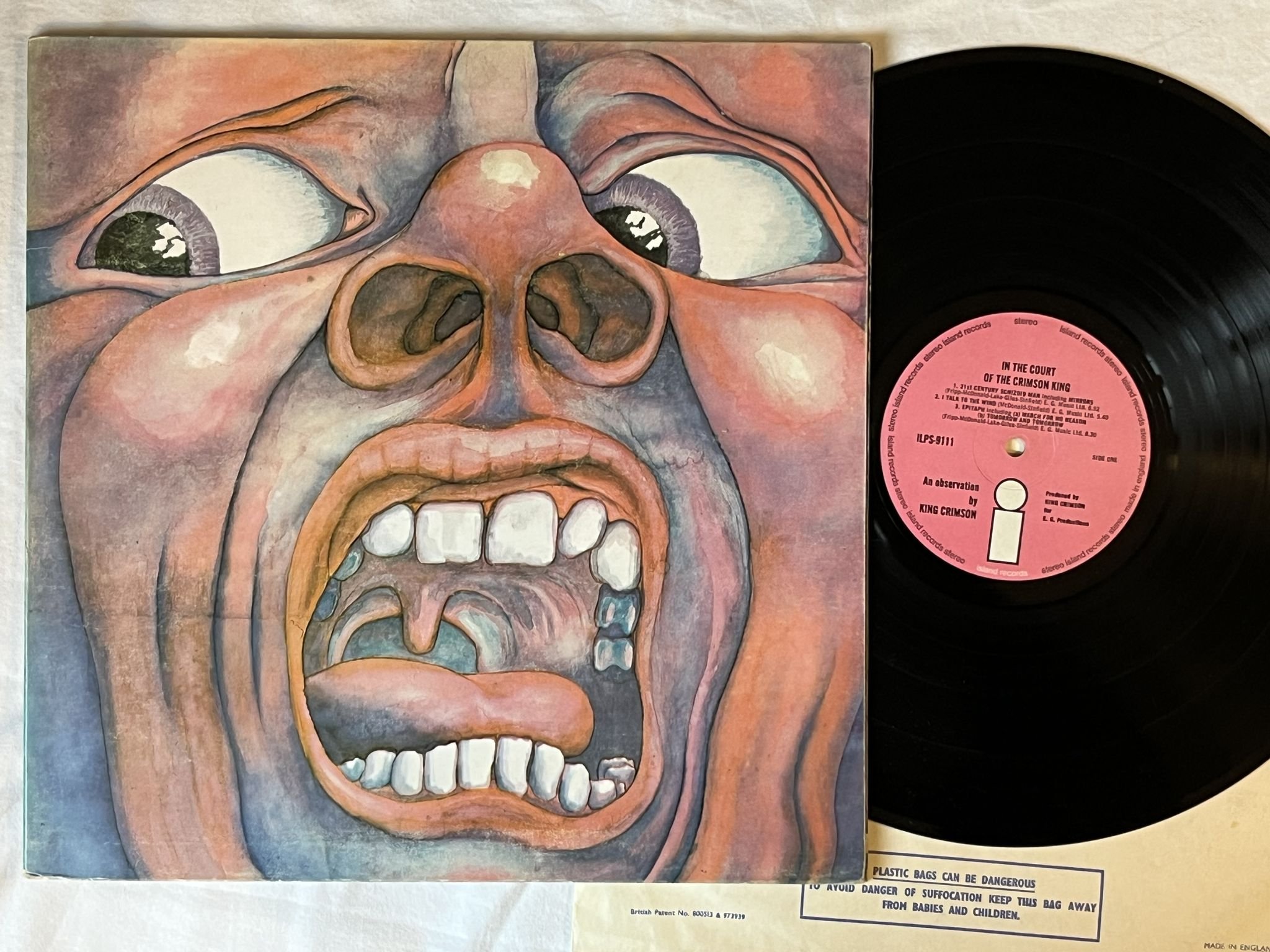 Omslagsbild för skivan KING CRIMSON in court of the crimson king LP (PINK LABEL) ILPS-9111 ISLAND REC