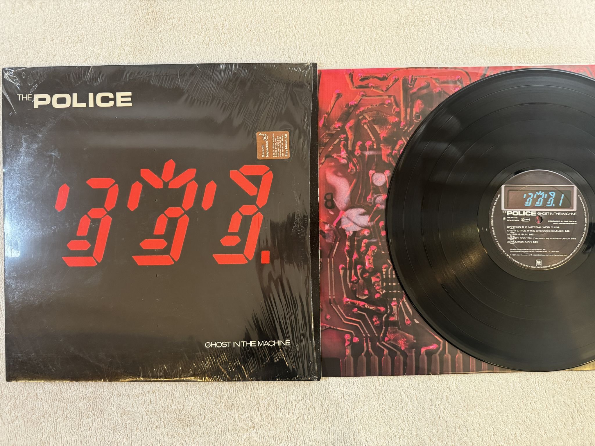 Omslagsbild för skivan THE POLICE ghost in the machine LP -81 AMLK 63730 A&M Records