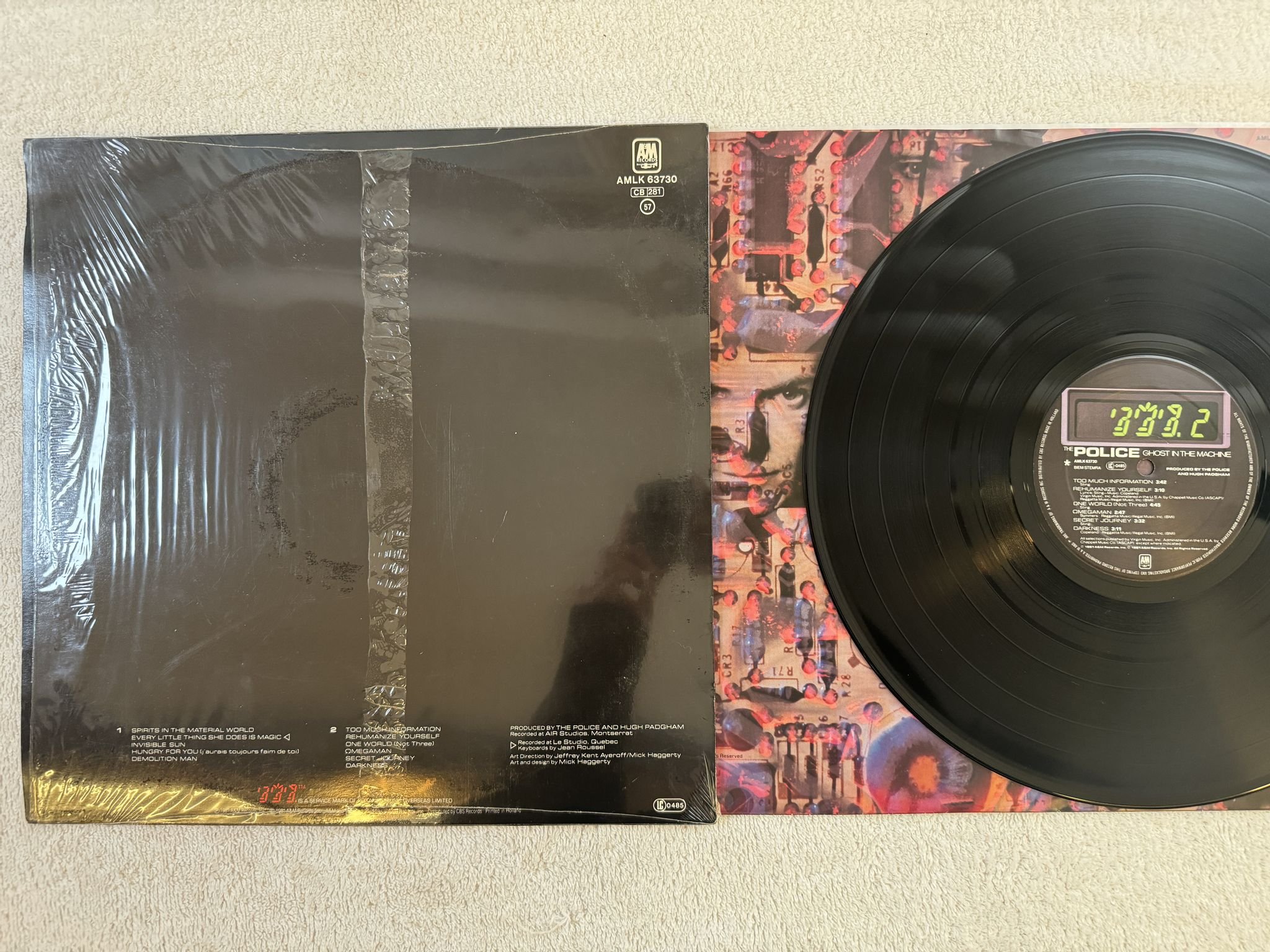 Omslagsbild för skivan THE POLICE ghost in the machine LP -81 AMLK 63730 A&M Records