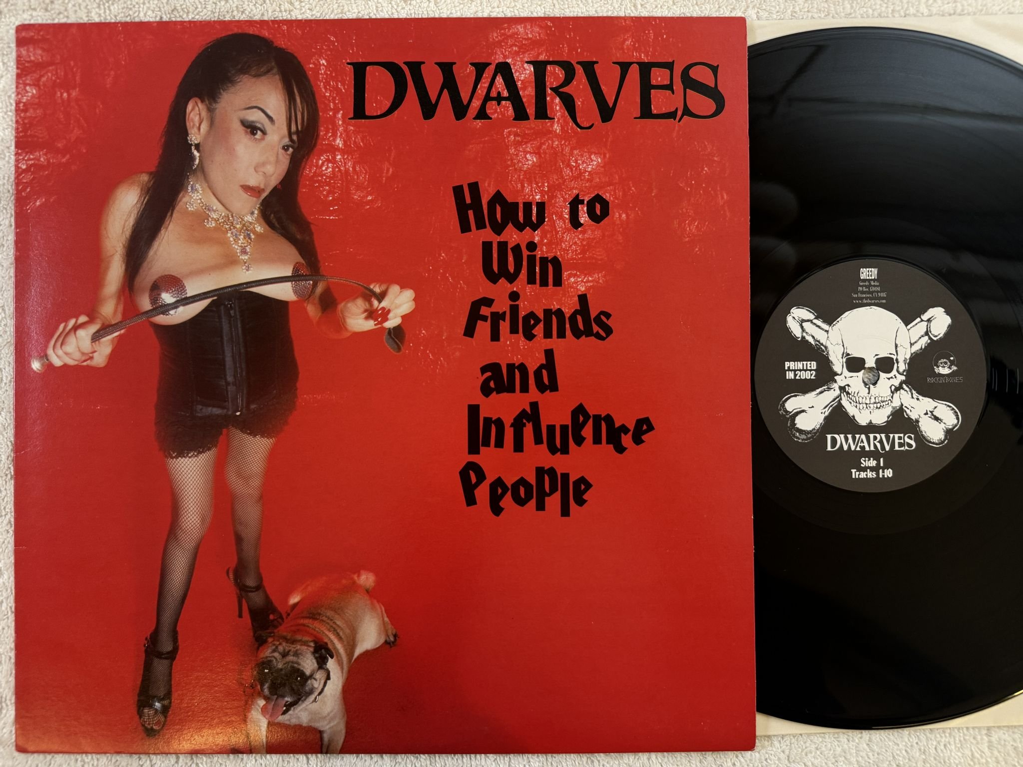Omslagsbild för skivan DWARVES how to win friends and influence people LP -2002 ROCKIN´BONES