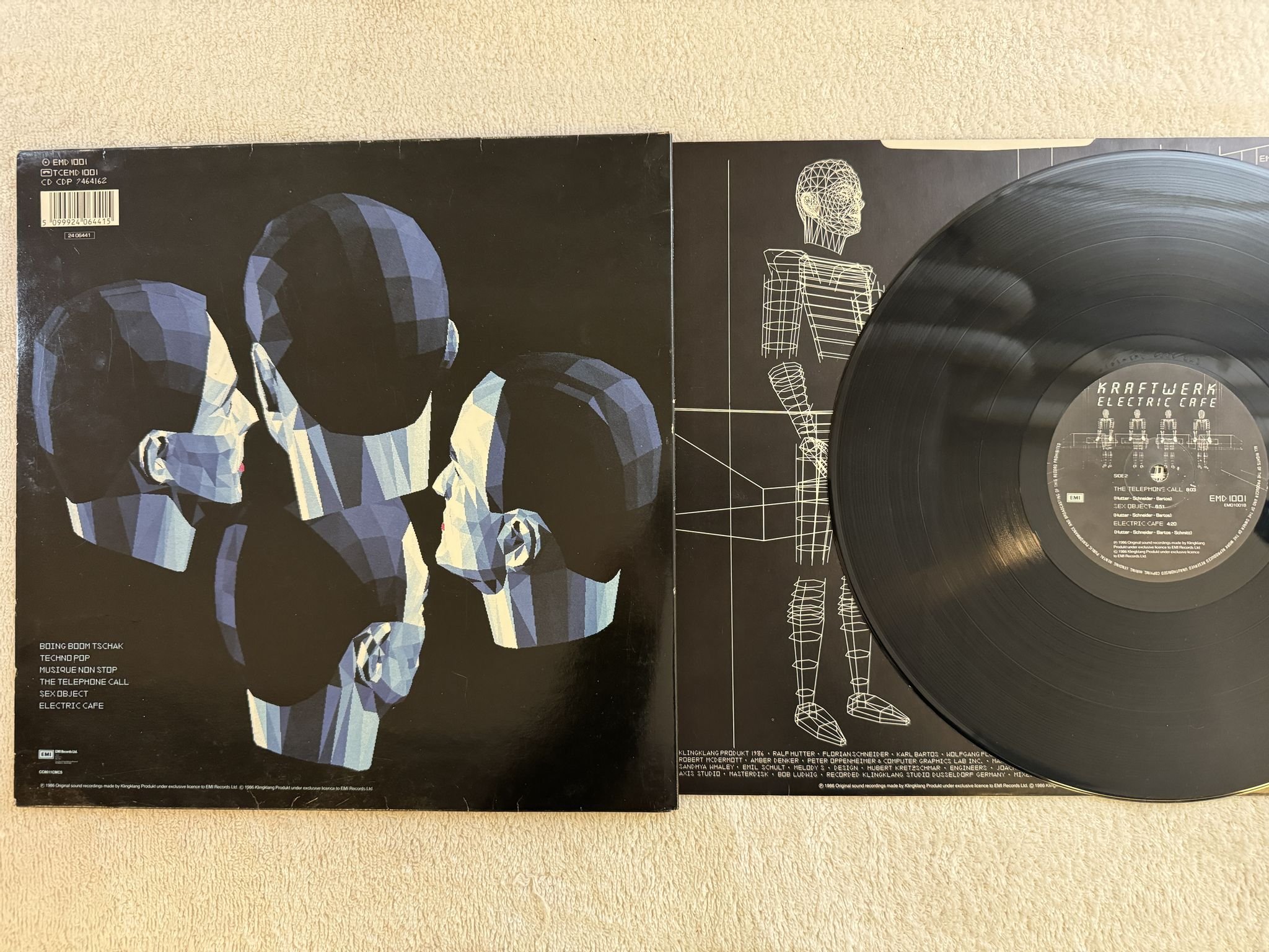 Omslagsbild för skivan KRAFTWERK electric cafe LP -86 24 06441 EMI