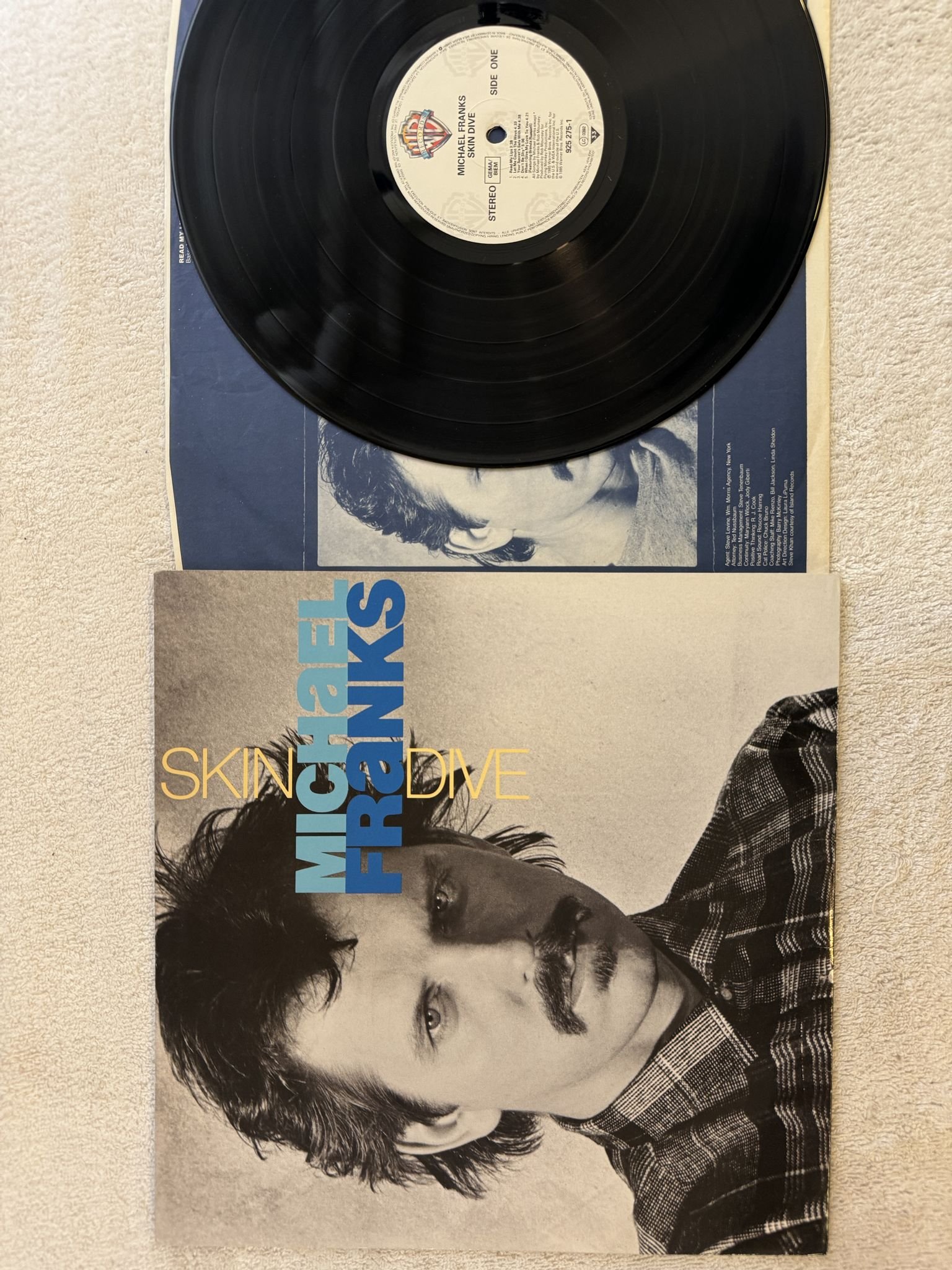 Omslagsbild för skivan MICHAEL FRANKS skin dive LP -88 Warner bros. Records 925 275-1