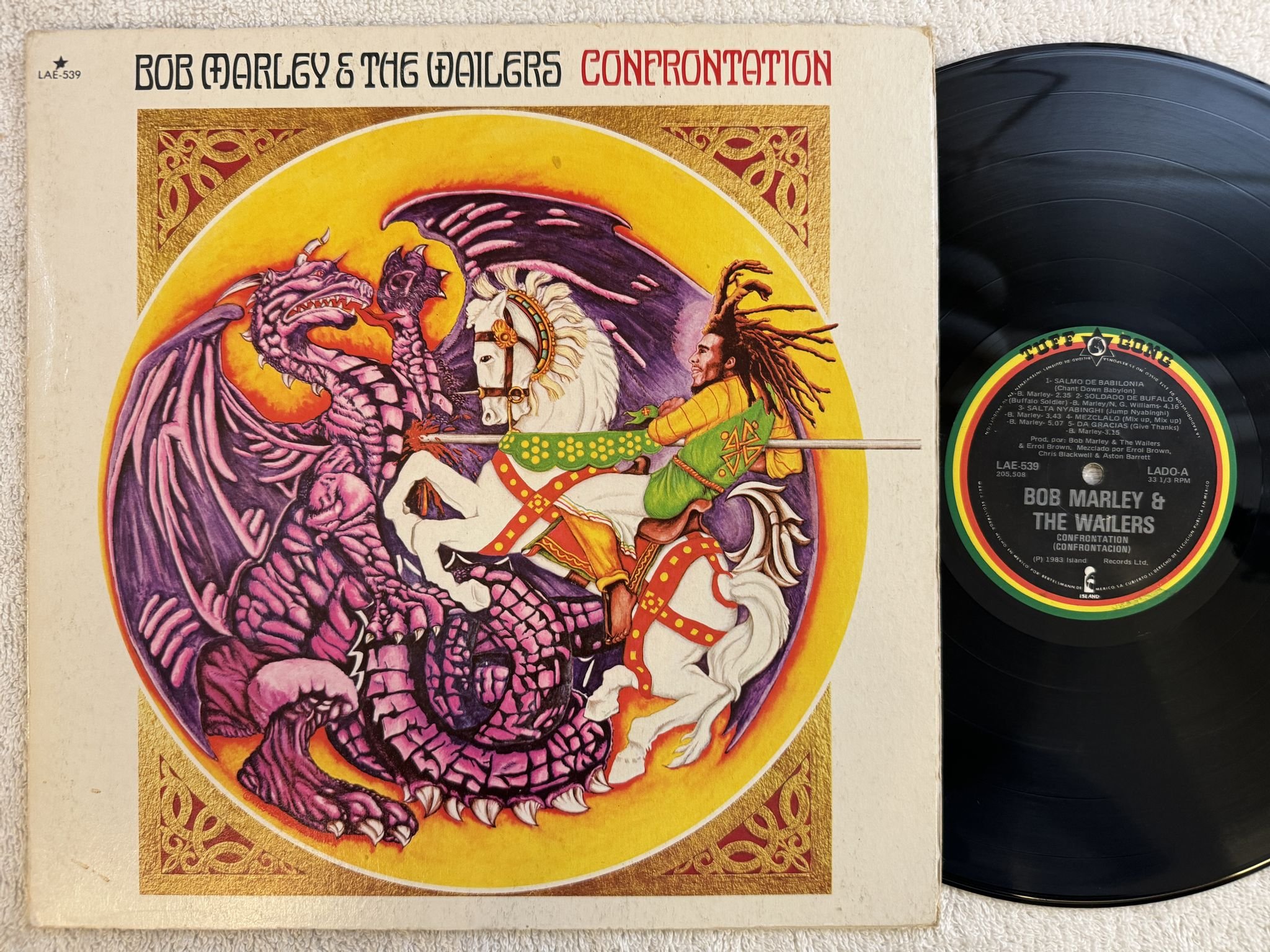 Omslagsbild för skivan BOB MARLEY & THE WAILERS confronation LP -83 LAE-539 Tuff Gong