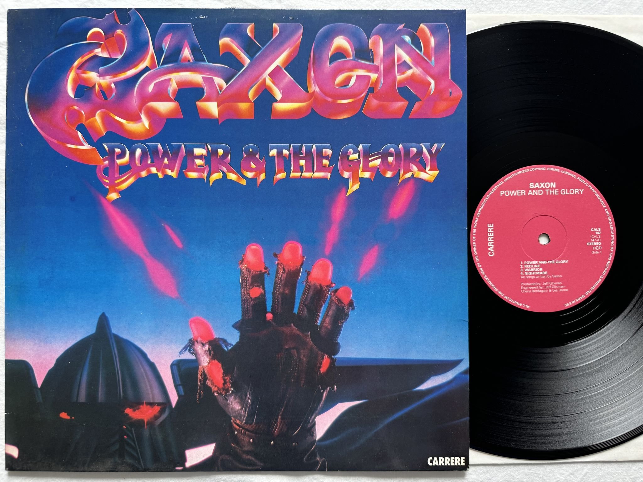 Omslagsbild för skivan SAXON power & the glory LP -83 CALS 147 Carrere