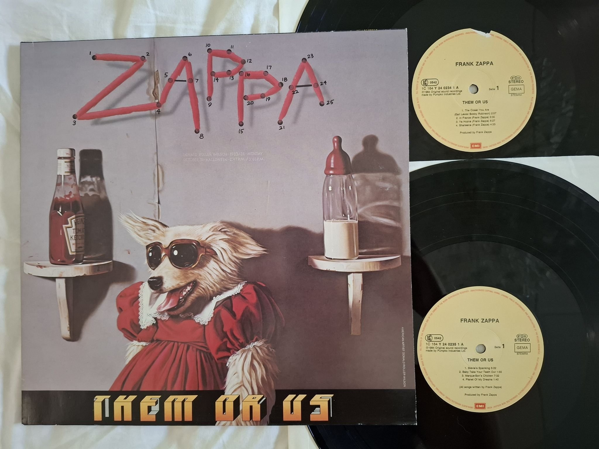 Omslagsbild för skivan ZAPPA them or us 2xLP -84 1C 164 Y 24 0234 3 EMI
