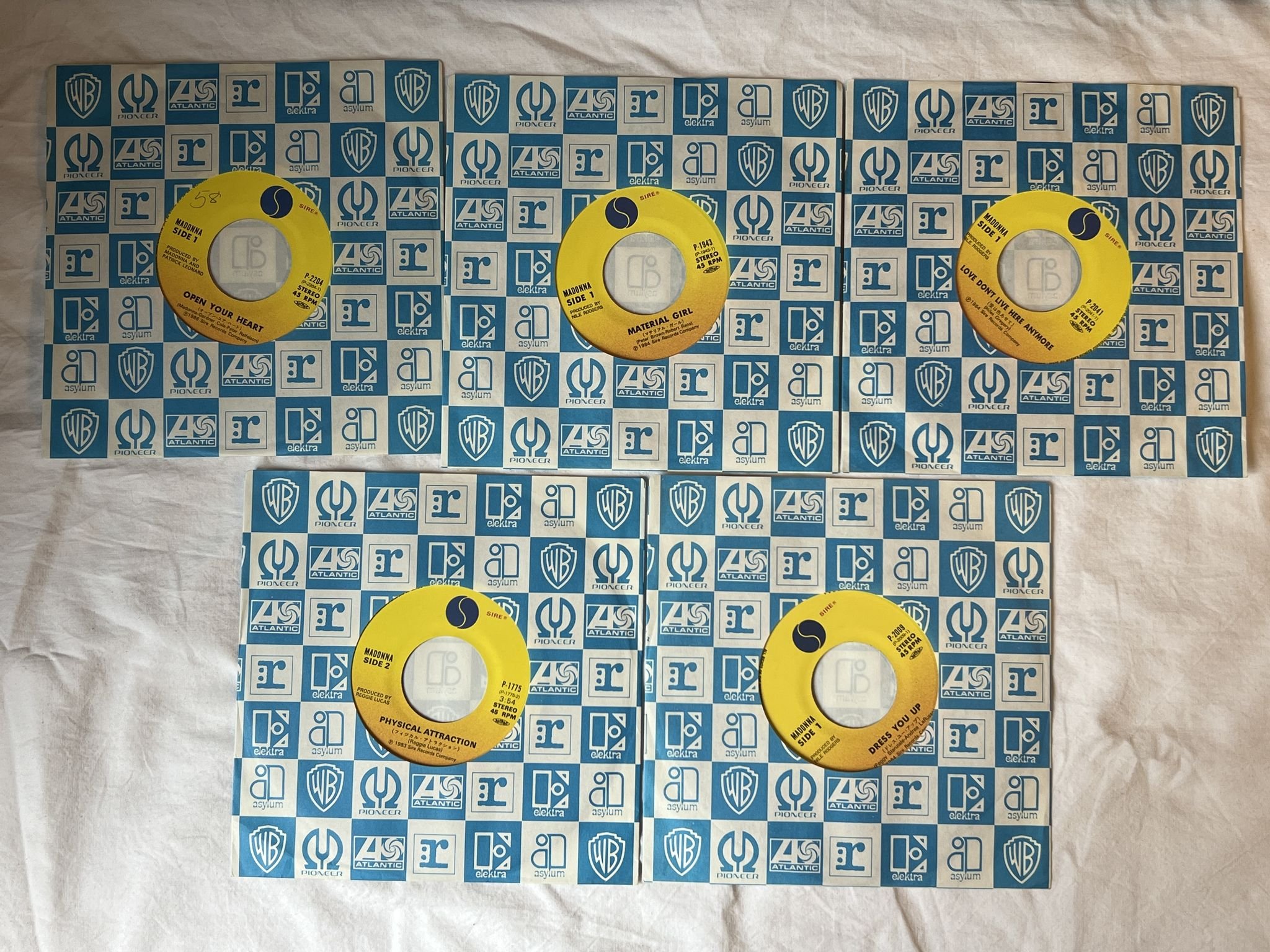 Omslagsbild för skivan MADONNA SINGLE PACKAGE "7" SINGLES JAPAN