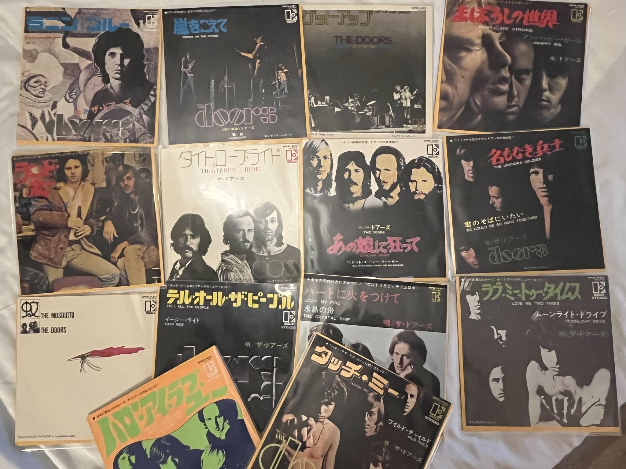 Omslagsbild för skivan THE DOORS Singles Box 14xCD box 2013 Japan ELEKTRA WPCR-14801/14