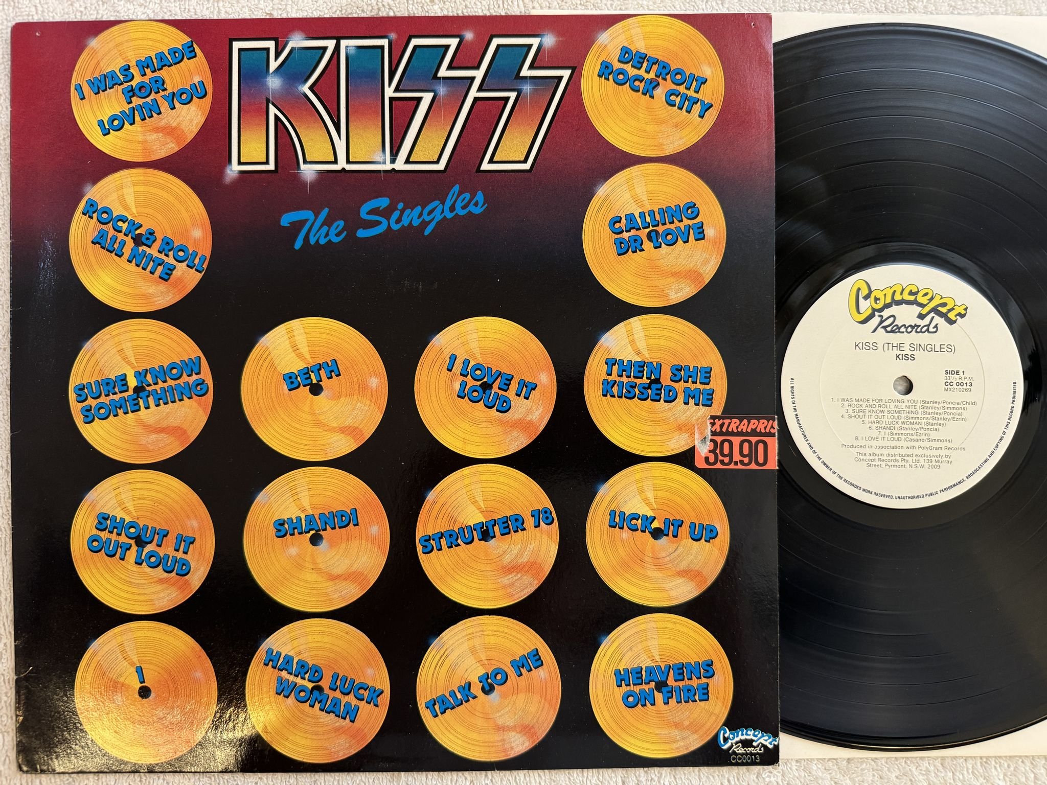 Omslagsbild för skivan KISS the singles LP -85 Australia CONCEPT CC 0013 *** Rare compilation ***