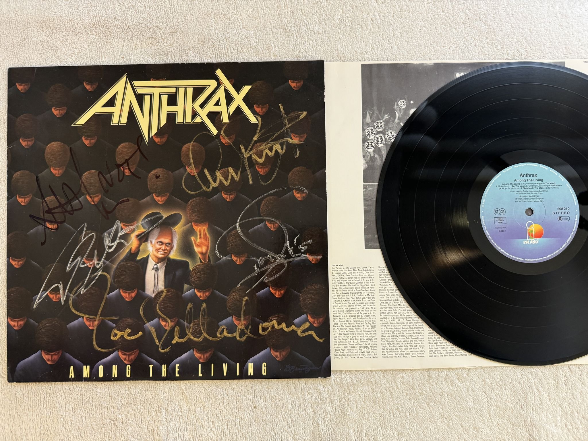 Omslagsbild för skivan ANTHRAX among the living LP -87 ISLAND 208210 *** SIGNED COVER ***