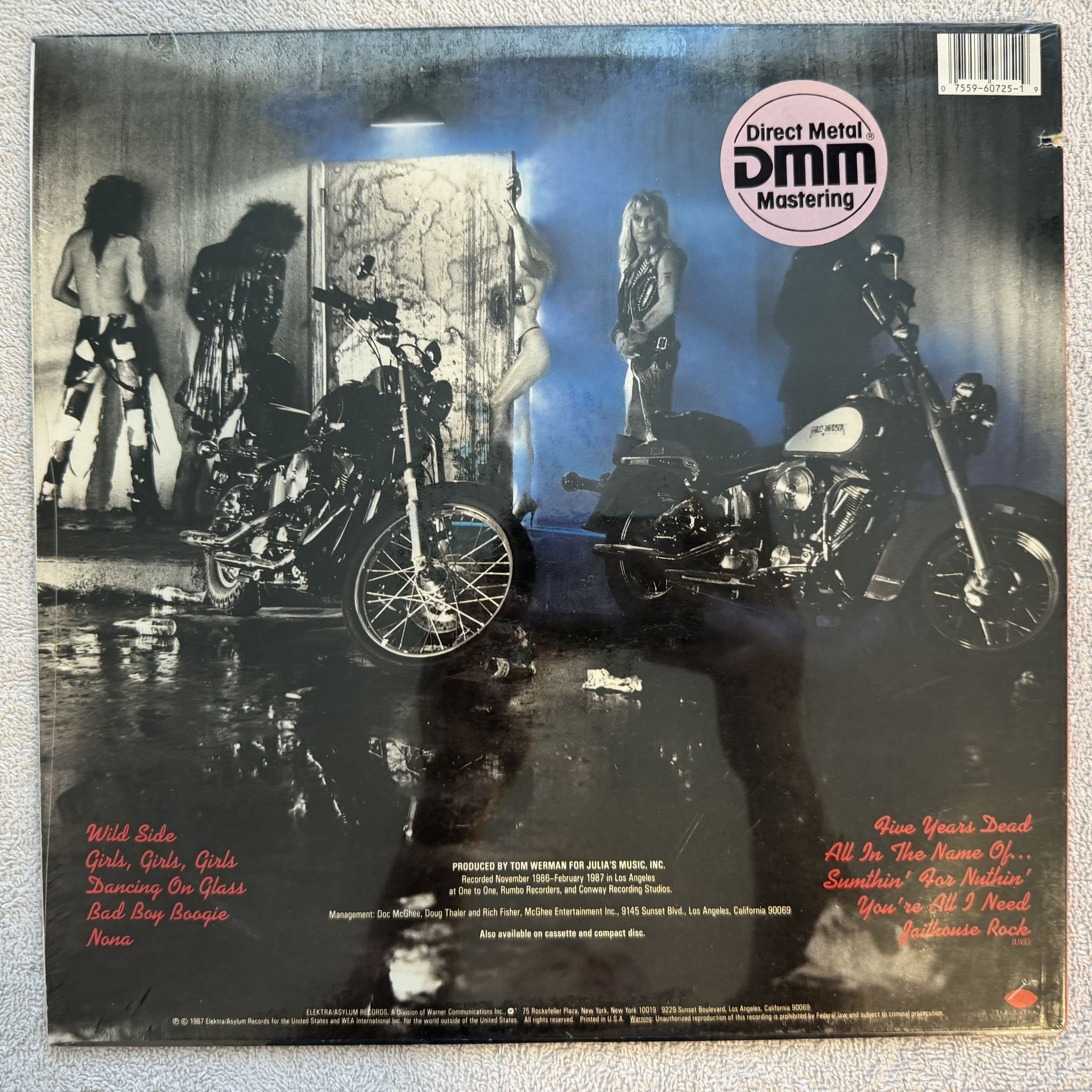 Omslagsbild för skivan MÖTLEY CRÜE girls girls girls LP -87 US ELEKTRA 9 60725-1 ** SEALED **