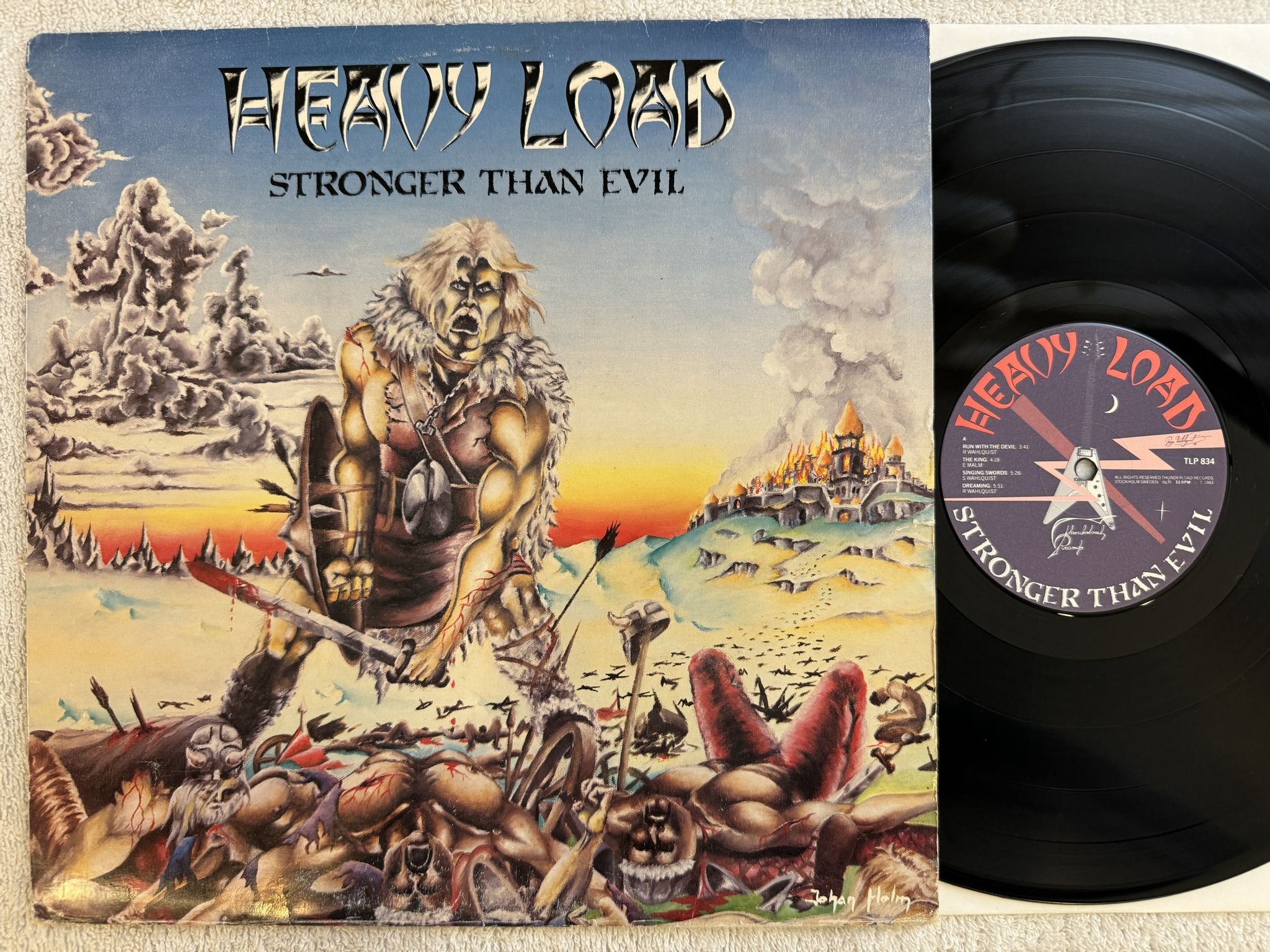 Omslagsbild för skivan HEAVY LOAD Stronger Than Evil LP -83 THUNDERLOAD TLP 834 *** POSTER ***